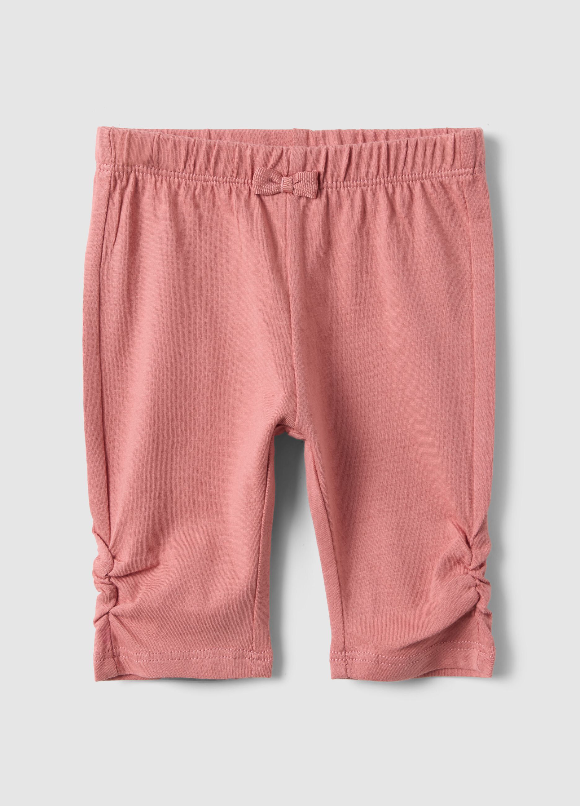 Slim fit pink cotton leggings for newborns with crumpled design