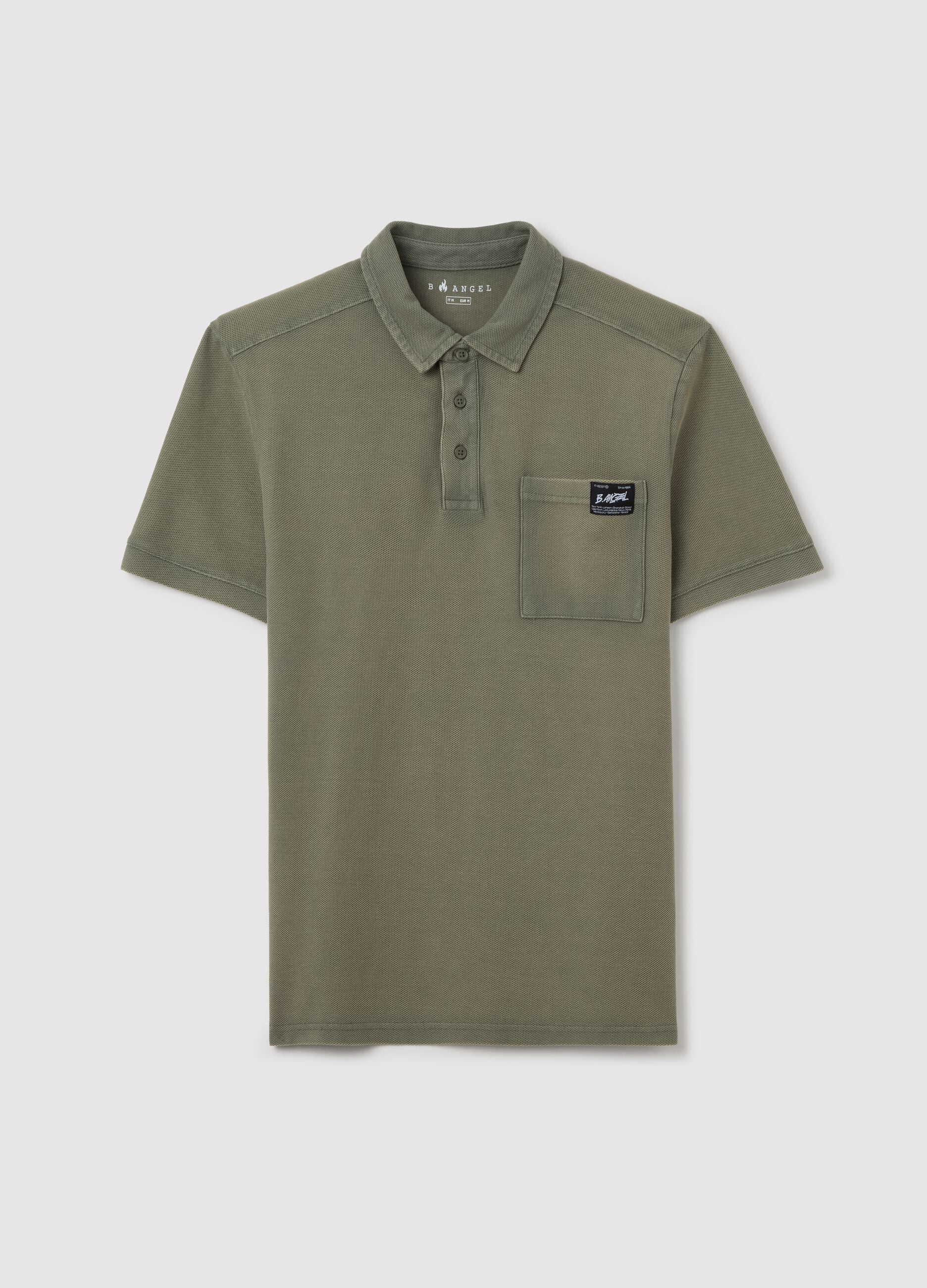 Green short-sleeved polo shirt in cotton piquet
