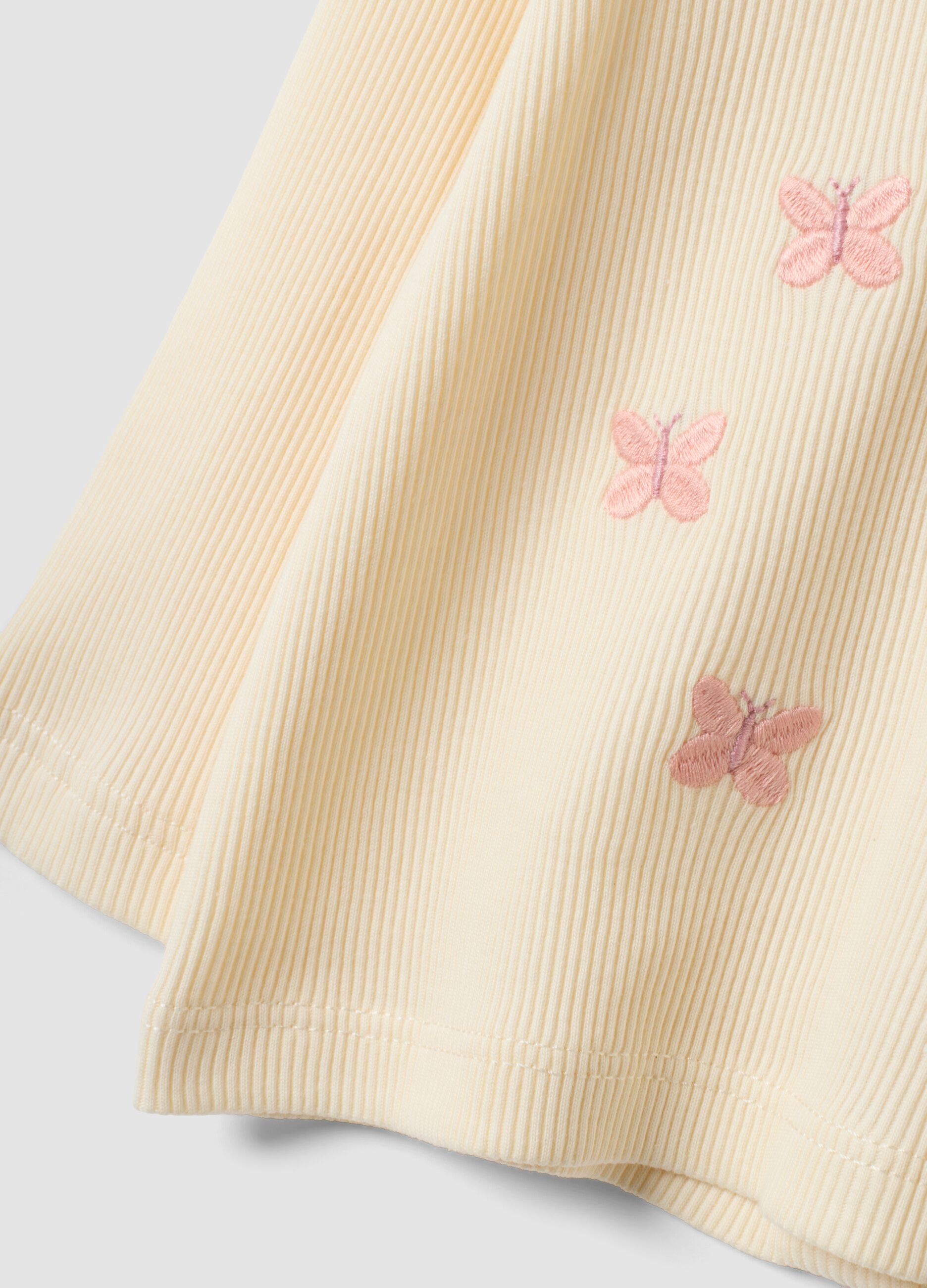 White organic cotton ribbed top with butterfly embroidery for baby girl