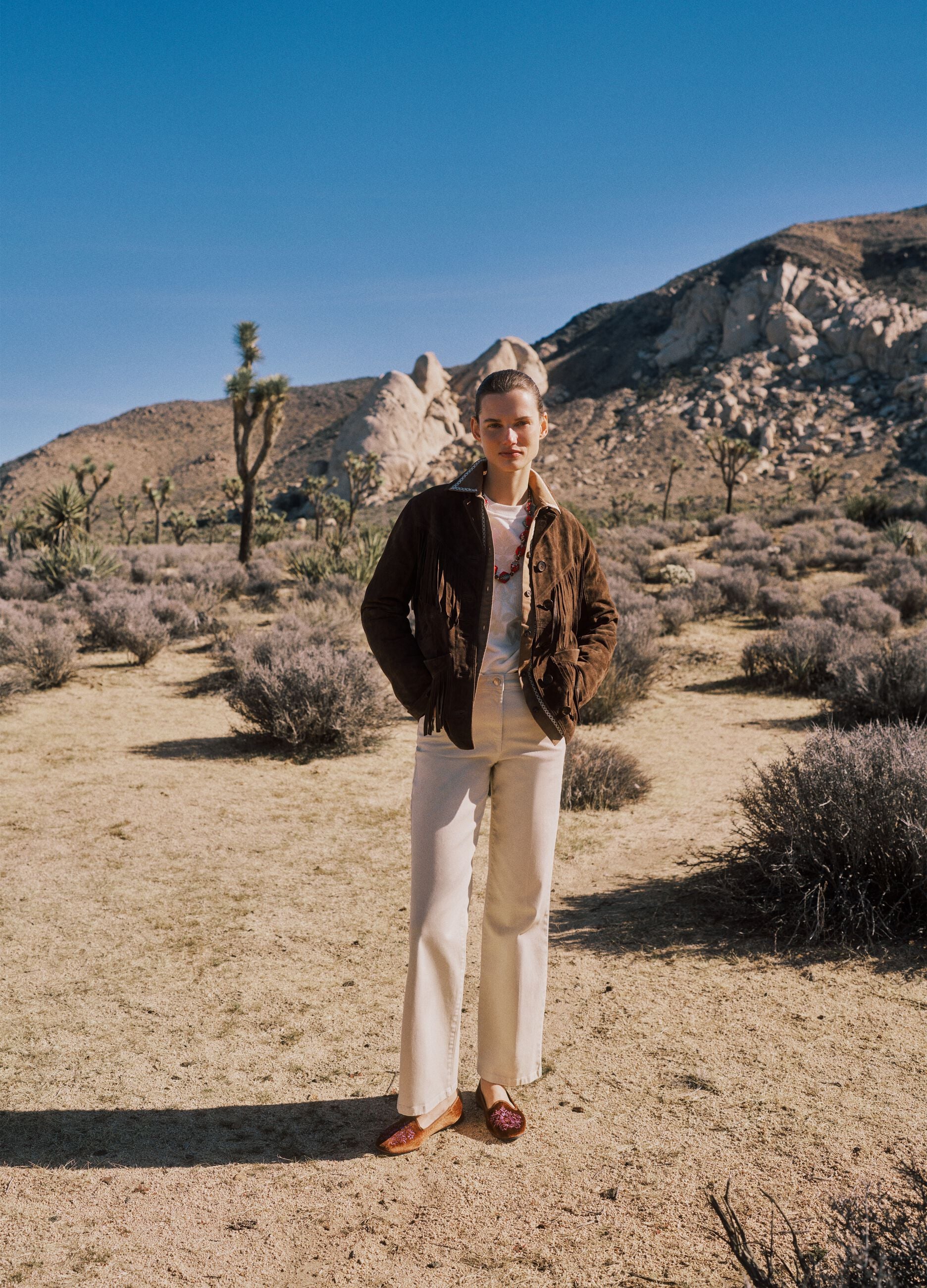 Brown genuine leather jacket with fringes