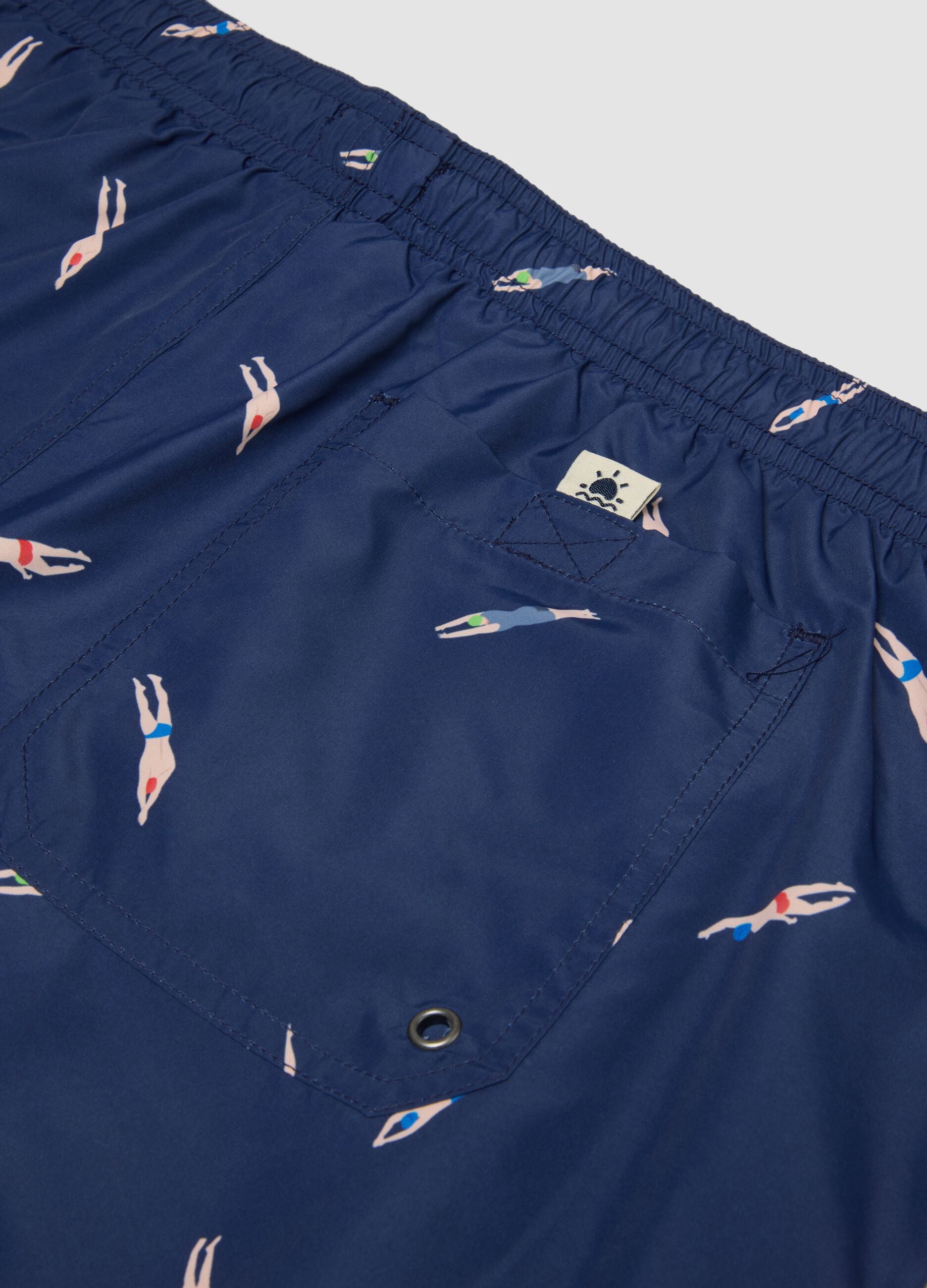 Blue boxer swim shorts with all-over print