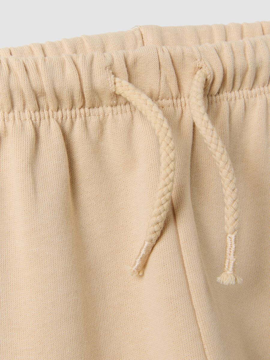 Beige pure cotton trousers with elasticated waist and print for baby girl_3