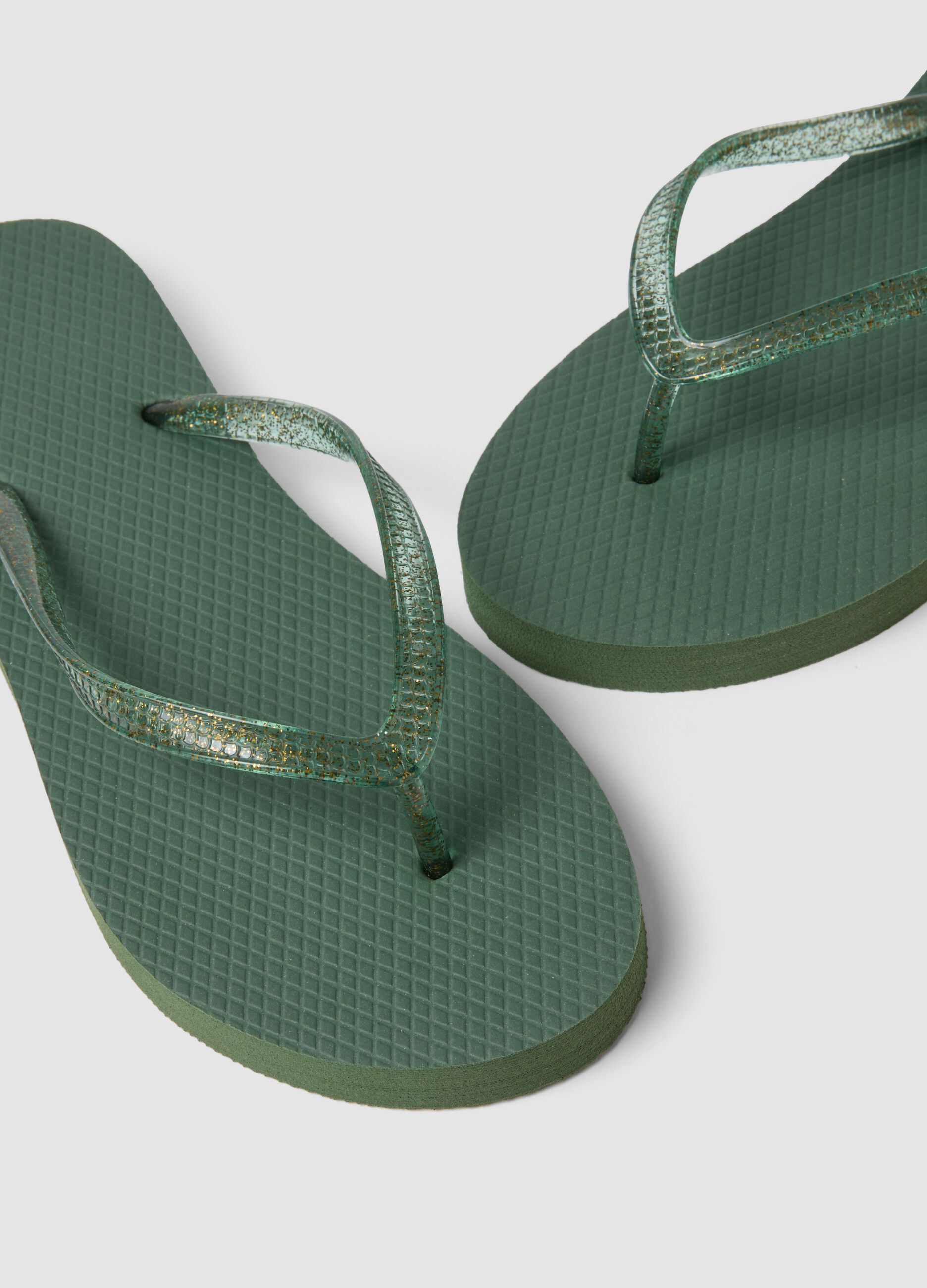 Green flip-flops with translucent straps