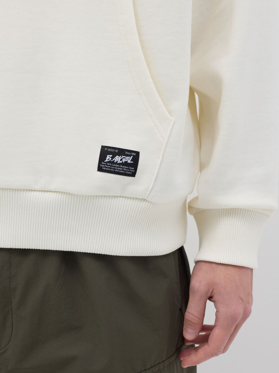Over-fit cotton hoodie._3