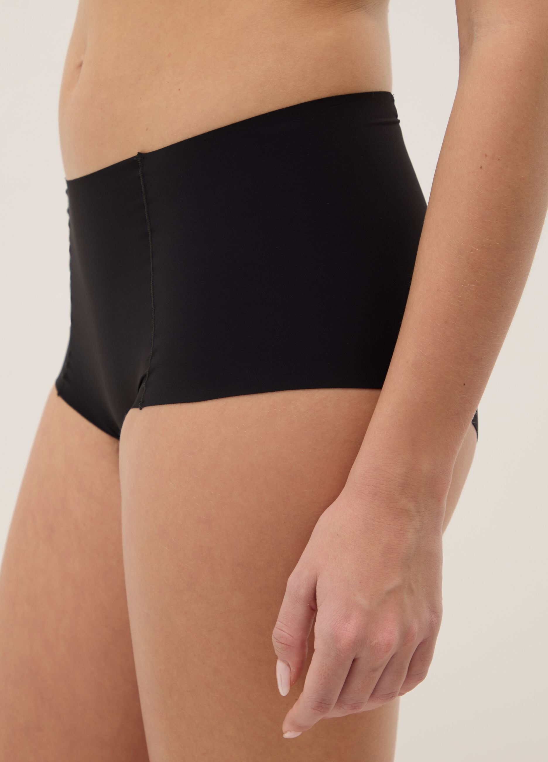 High-waisted black briefs