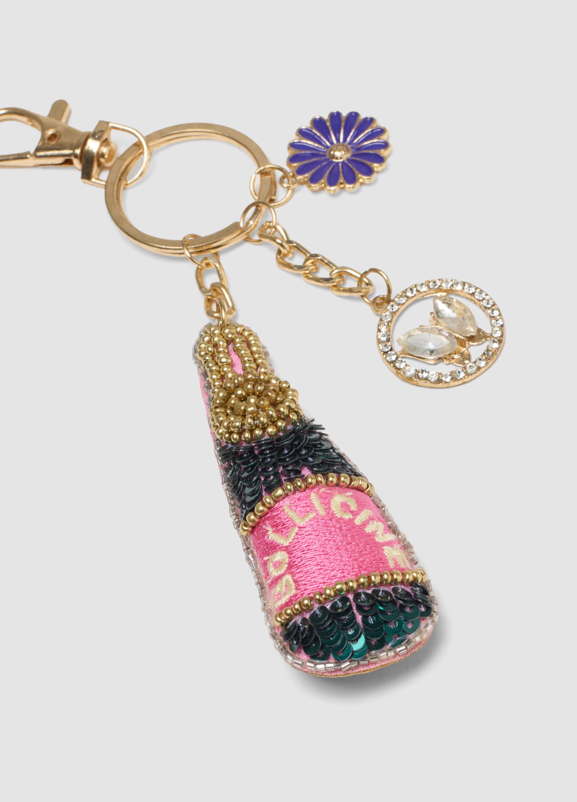 Multicolour pendant with charms and gold details