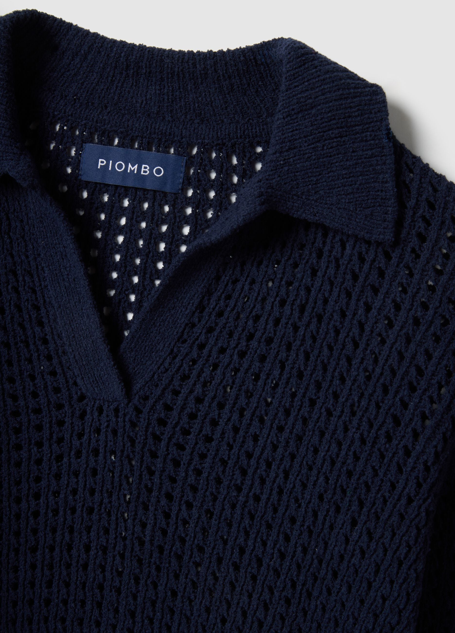 Blue cotton blend regular fit jumper with mesh pattern and polo collar