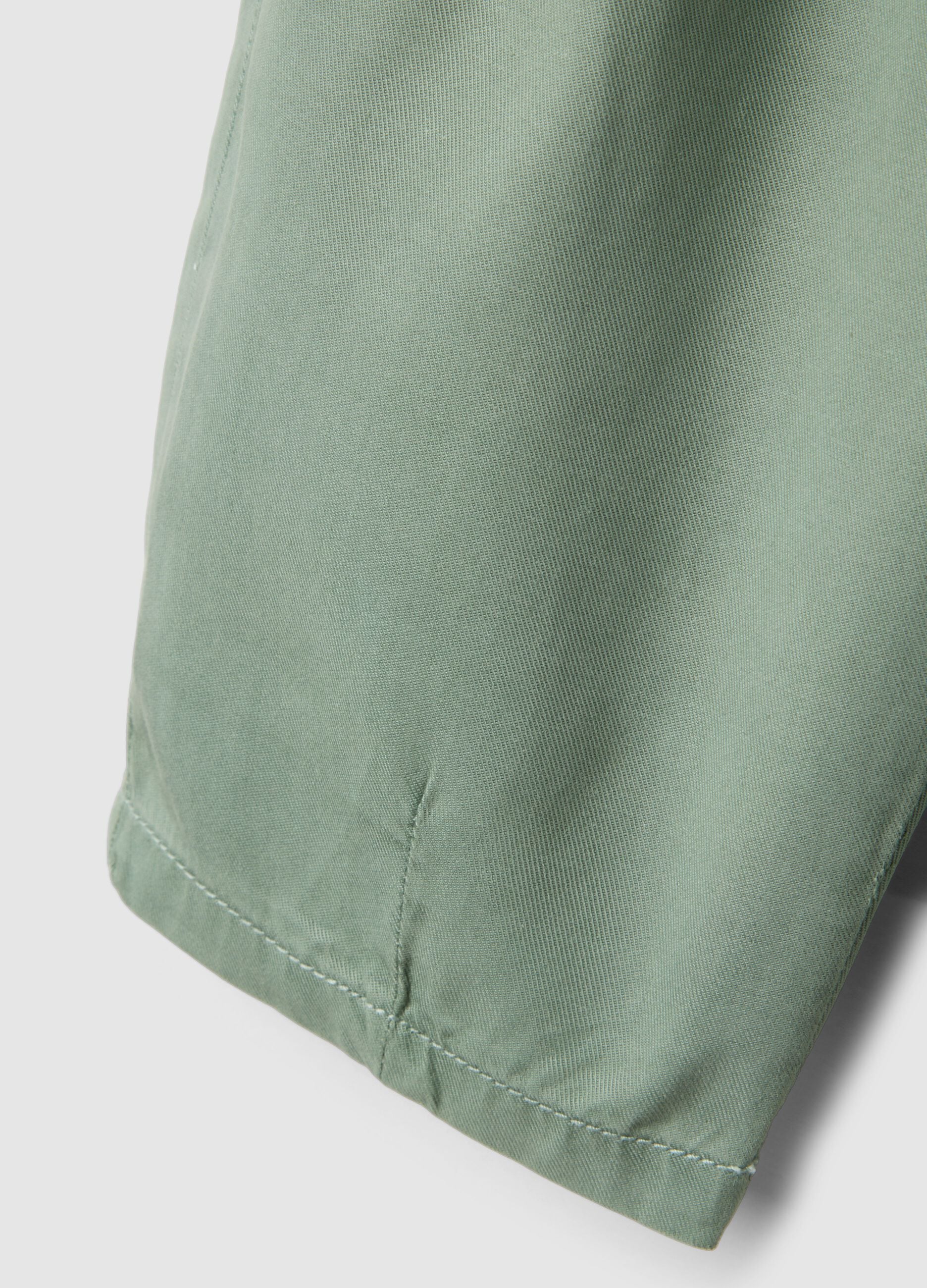 Green girl's baggy trousers in lyocell and cotton
