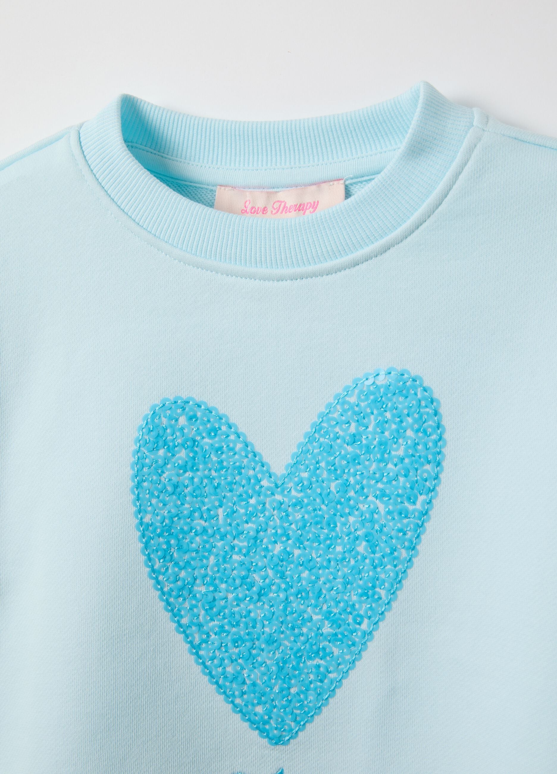 Sky blue cotton blend regular fit sweatshirt with heart for girls