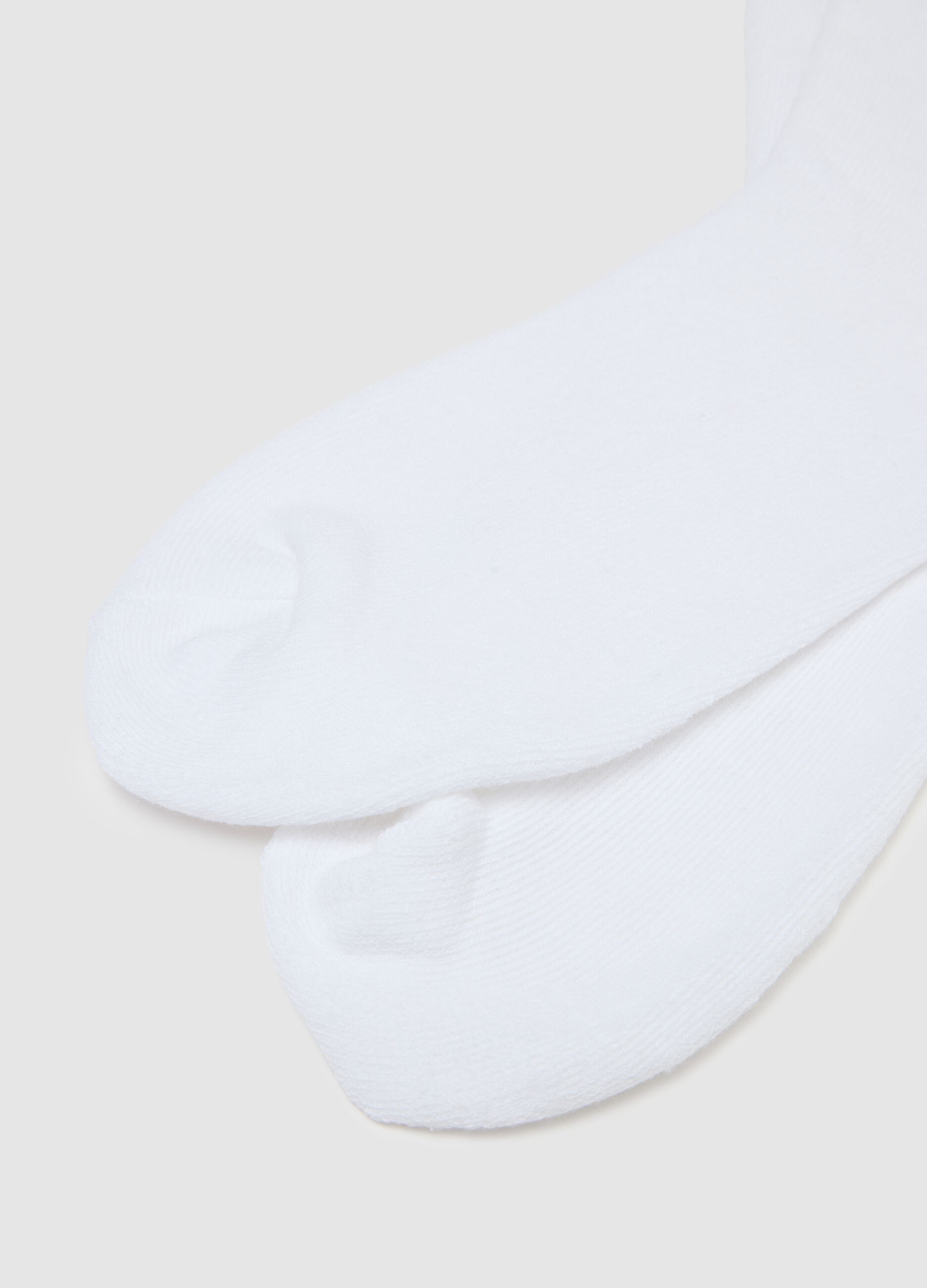Tripack of white sports socks in elasticated cotton