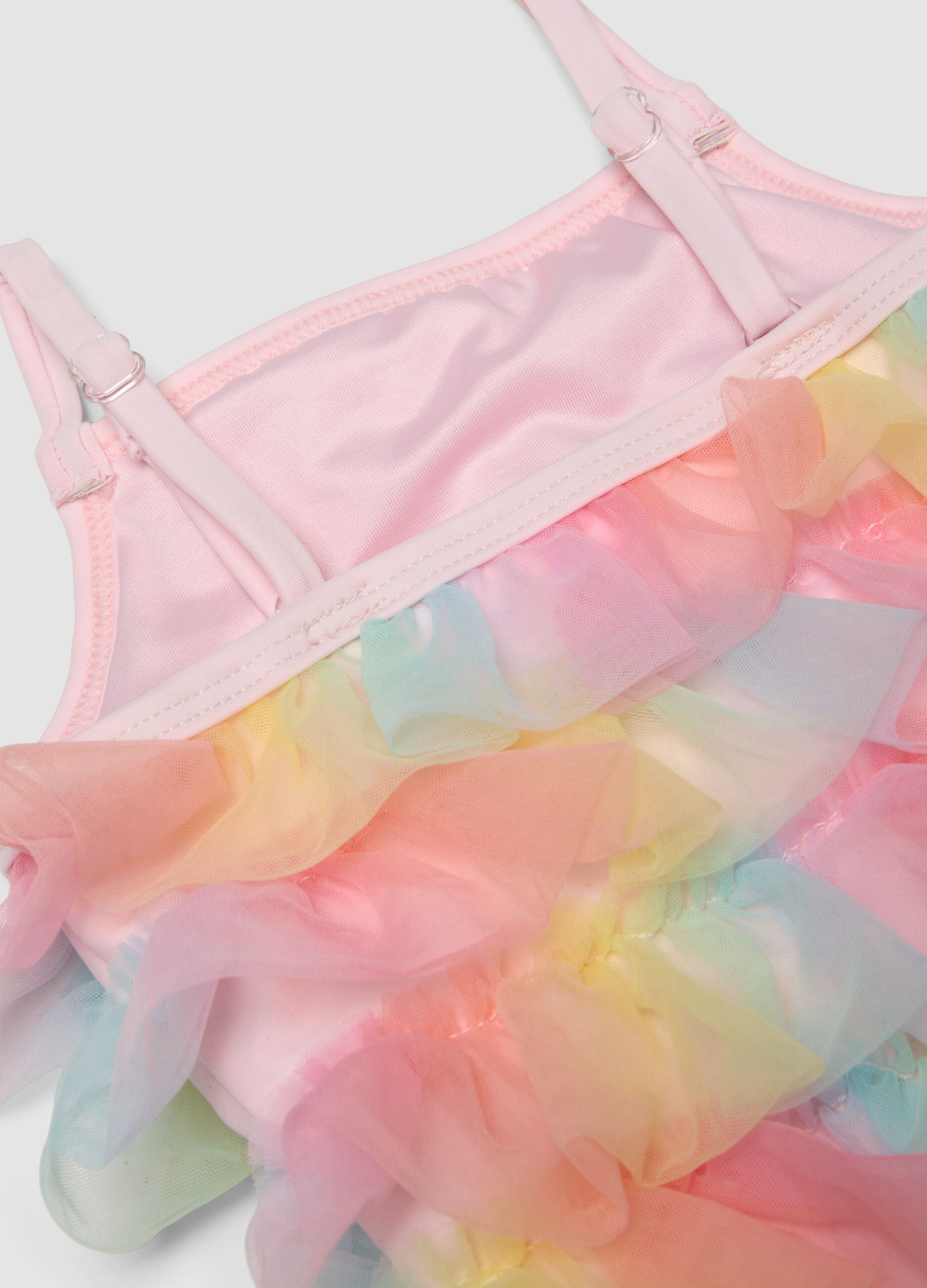 Pink one-piece swimsuit with tulle frills for baby girls