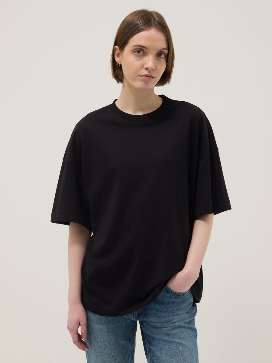 T-shirt a maniche corte in puro cotone nera oversize fit_0