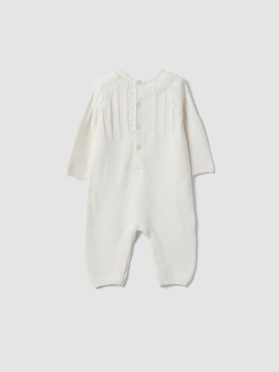 White organic cotton baby sleepsuit with cable knit detail_1