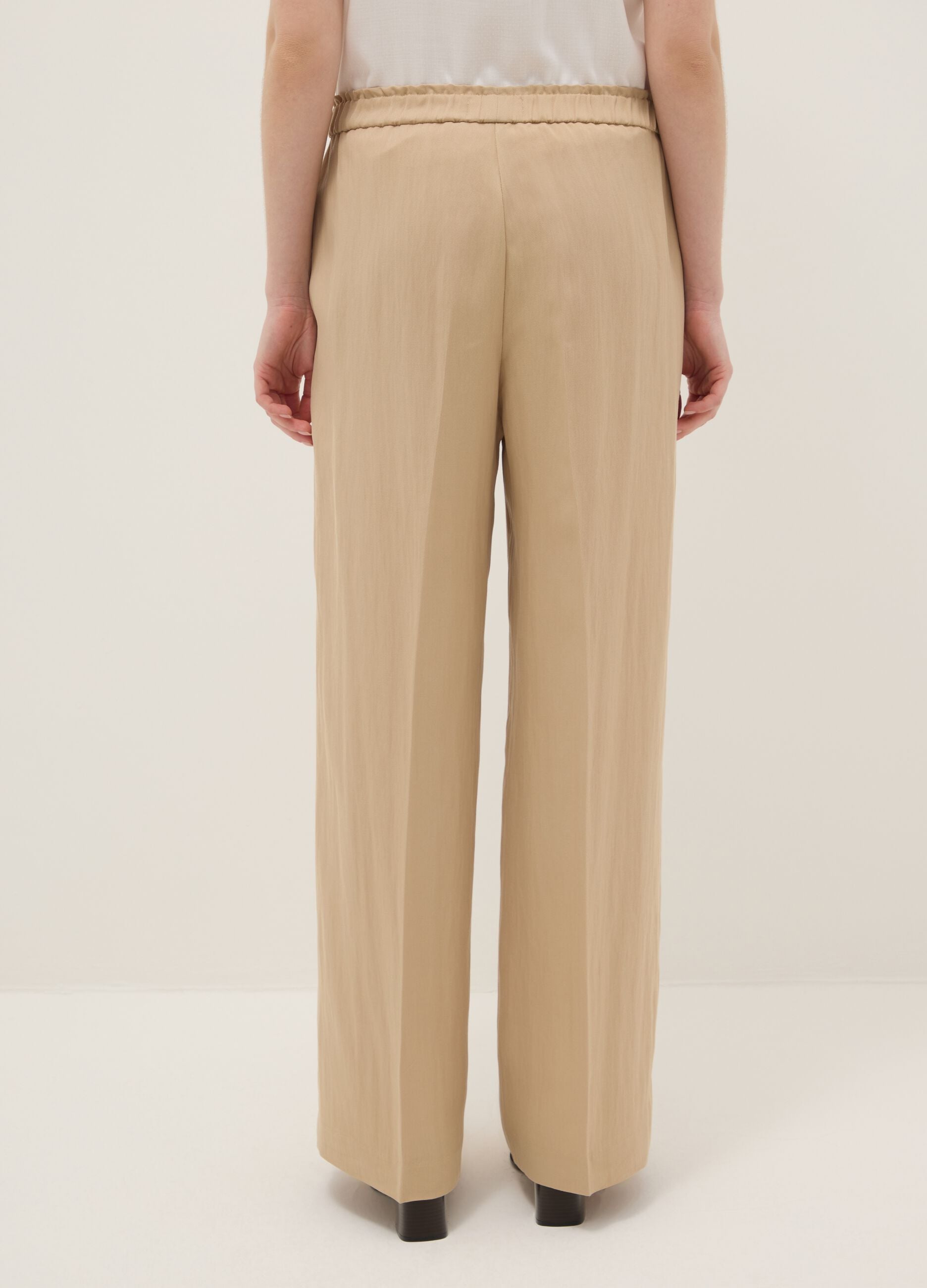 Beige wide leg jogger trousers in Lyocell and viscose blend