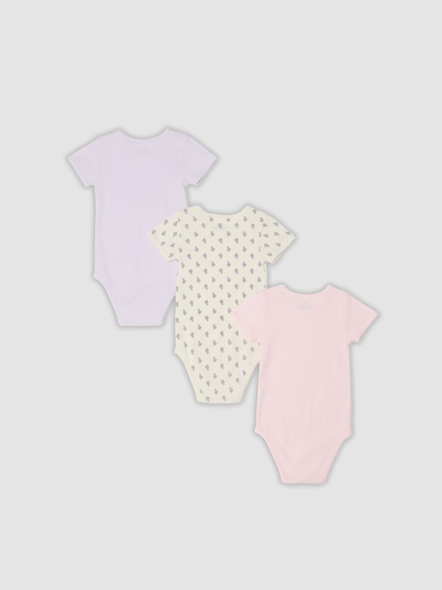 Multicoloured 3-pack of pure organic cotton bodysuits for baby girls_1