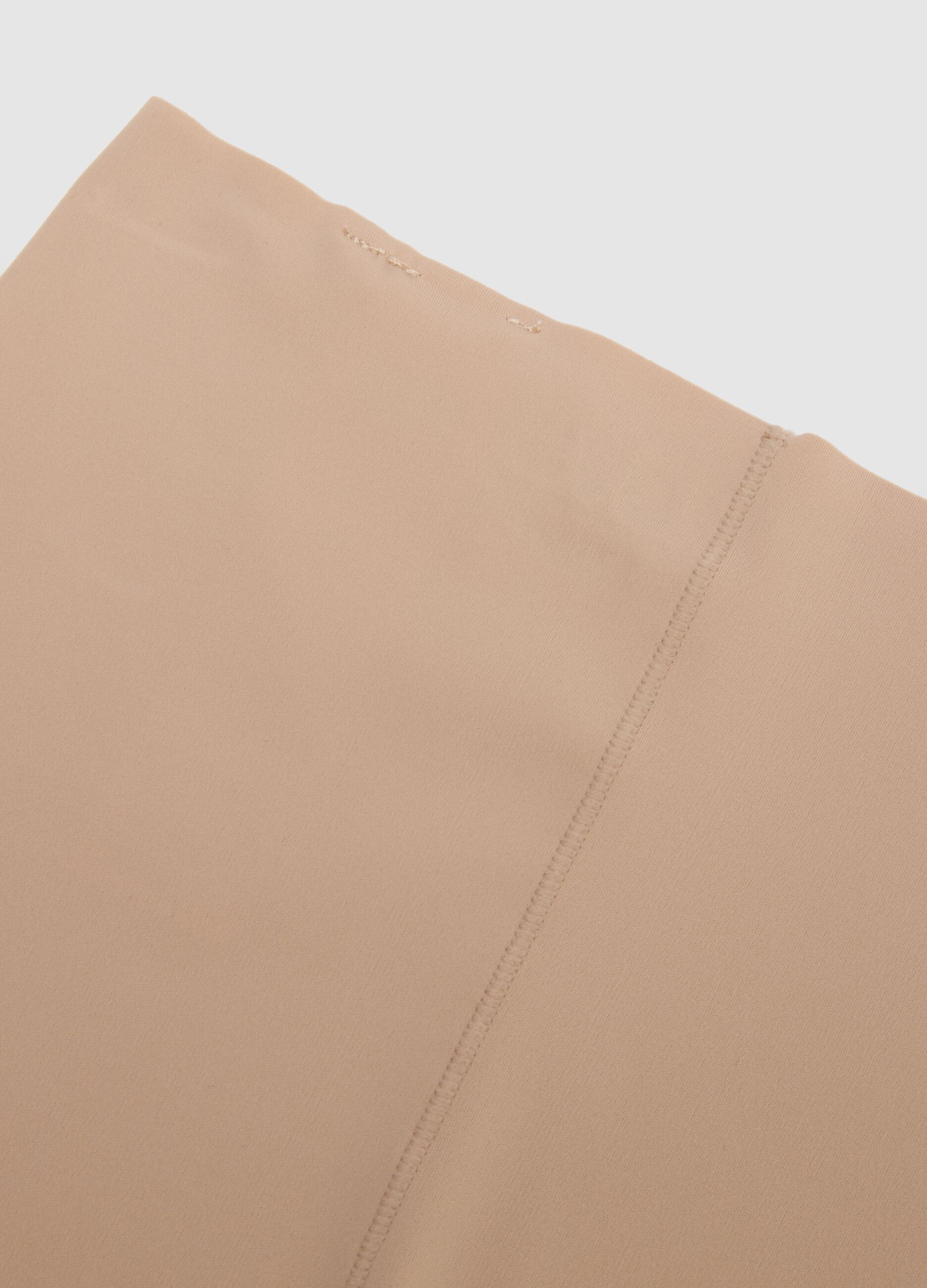 High-waisted beige briefs