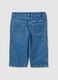 Wide blue denim jeans in cotton blend with embroidered hearts for girls_1