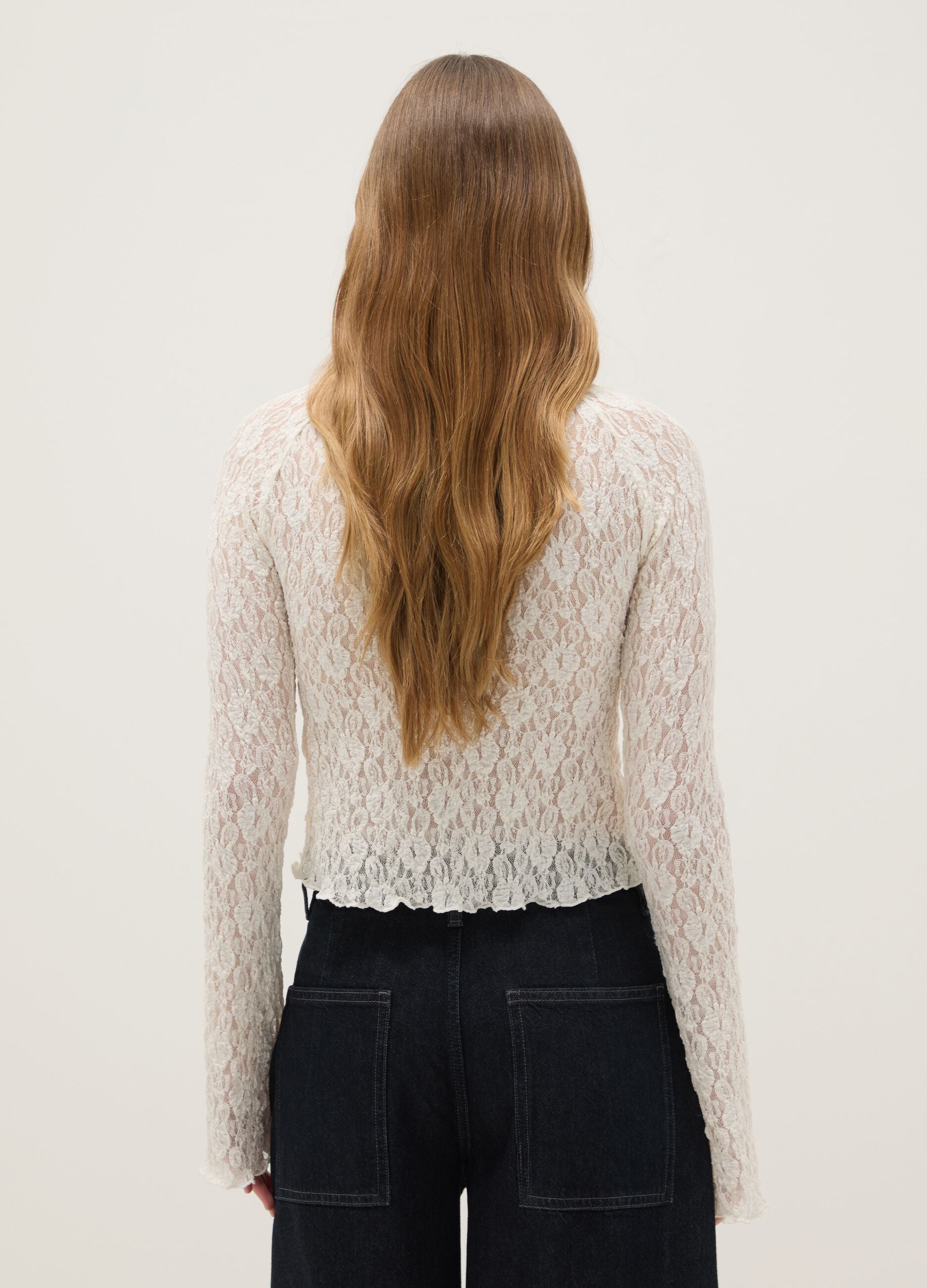 White long-sleeve top with lace
