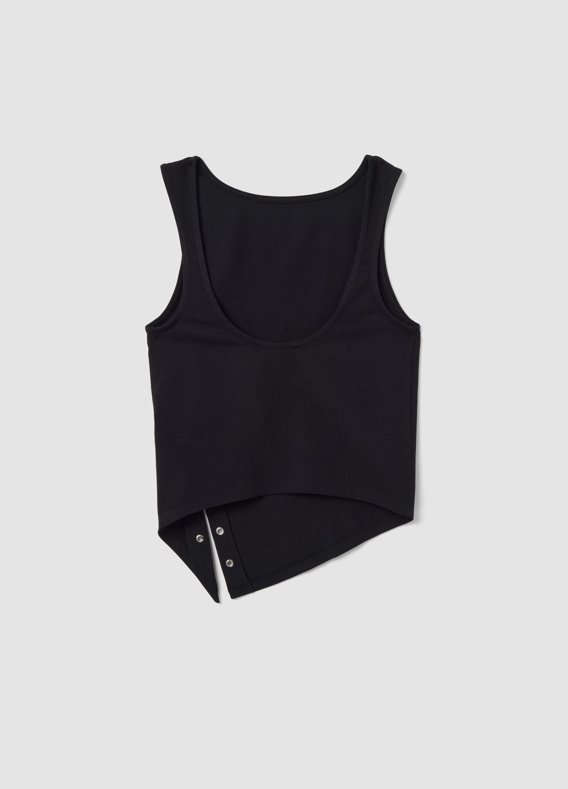 Black stretch-cotton top with asymmetric hem and metal eyelets