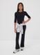 Black flared stretch organic cotton trousers for girls_0