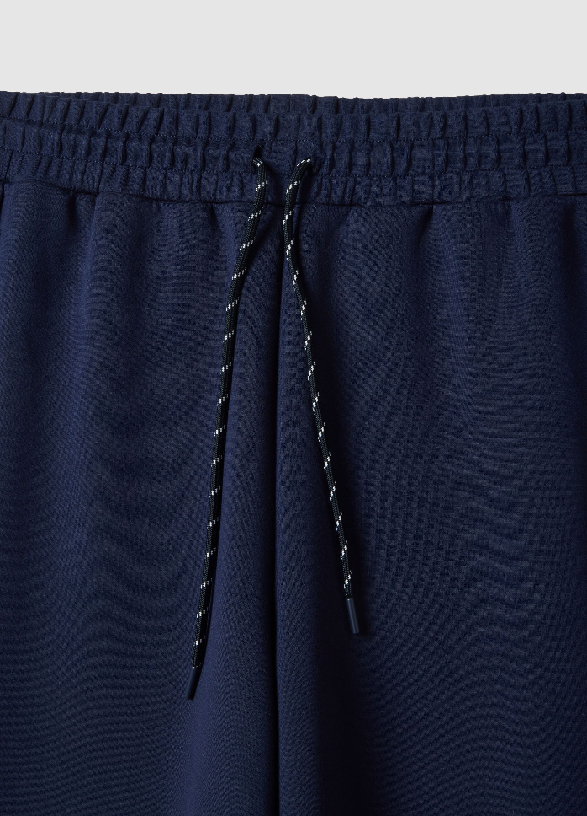 Blue wide leg trousers in stretch modal blend