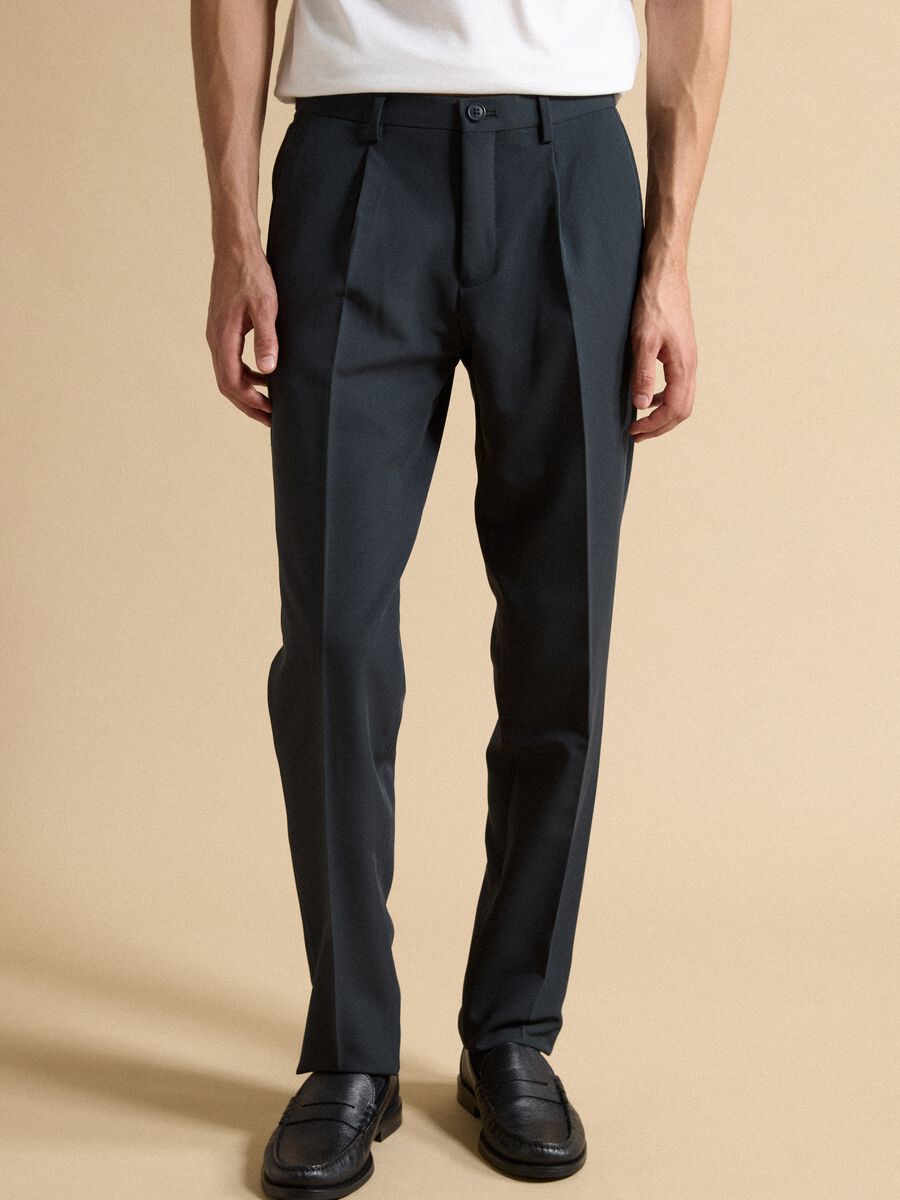 Pantaloni formali blu in twill di viscosa elasticizzata slim fit_1