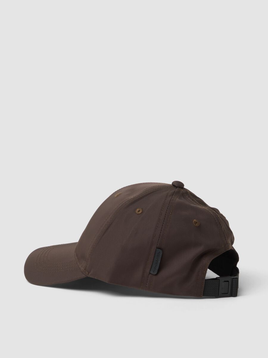 Brown cap with curved peak_1