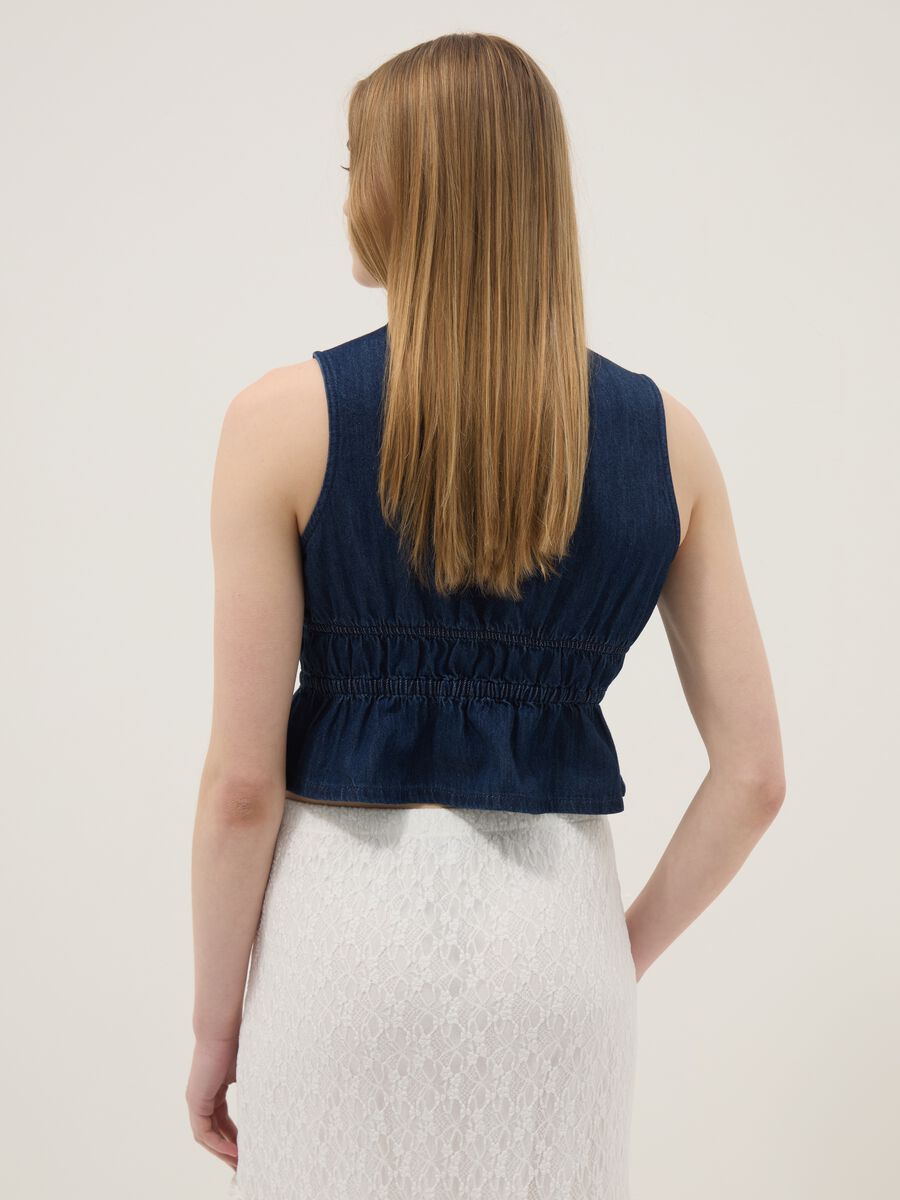 Blue sleeveless denim blouse in pure cotton, slim fit with tie fastening_3