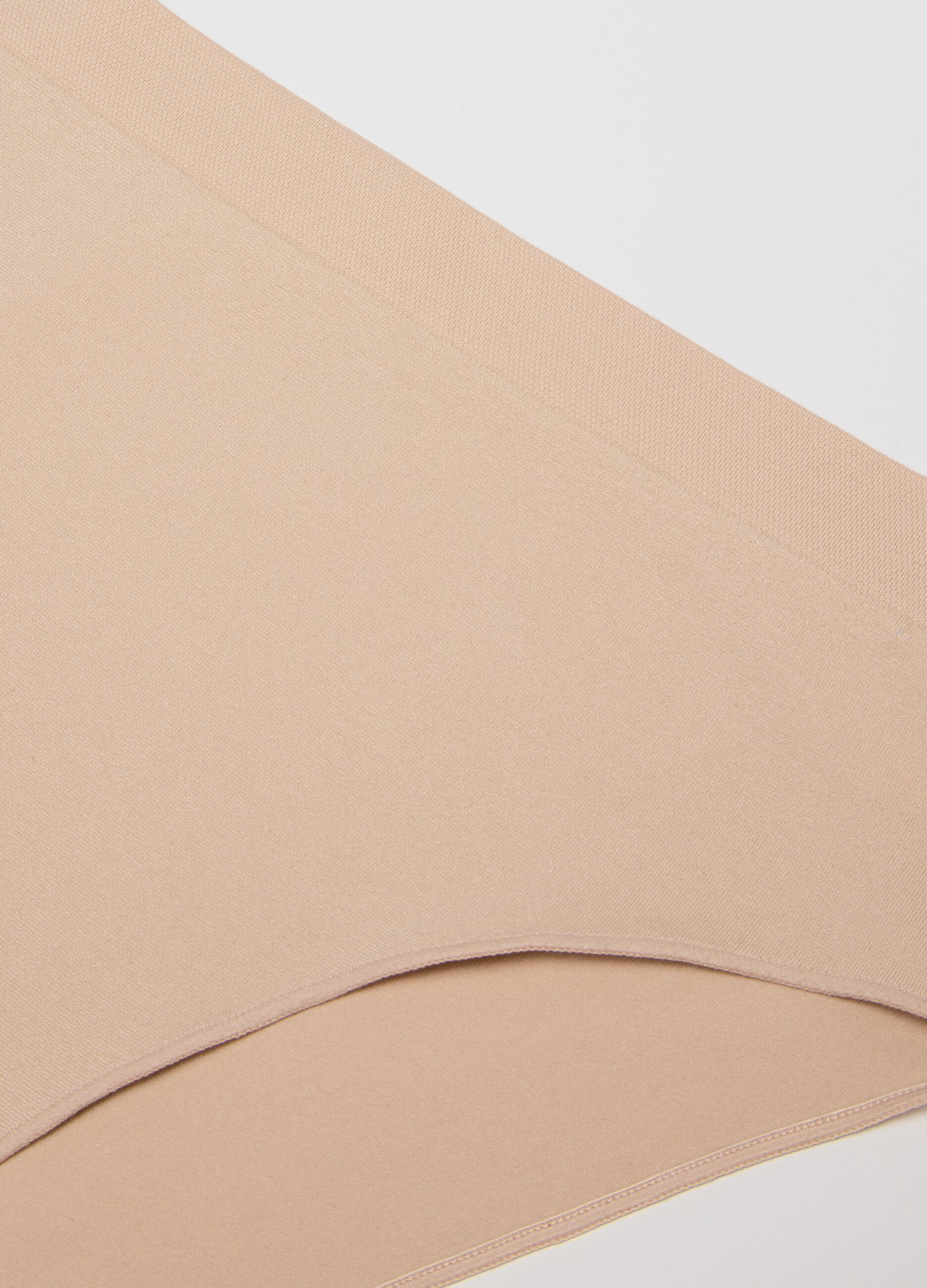 High-waisted stretchy beige fabric briefs