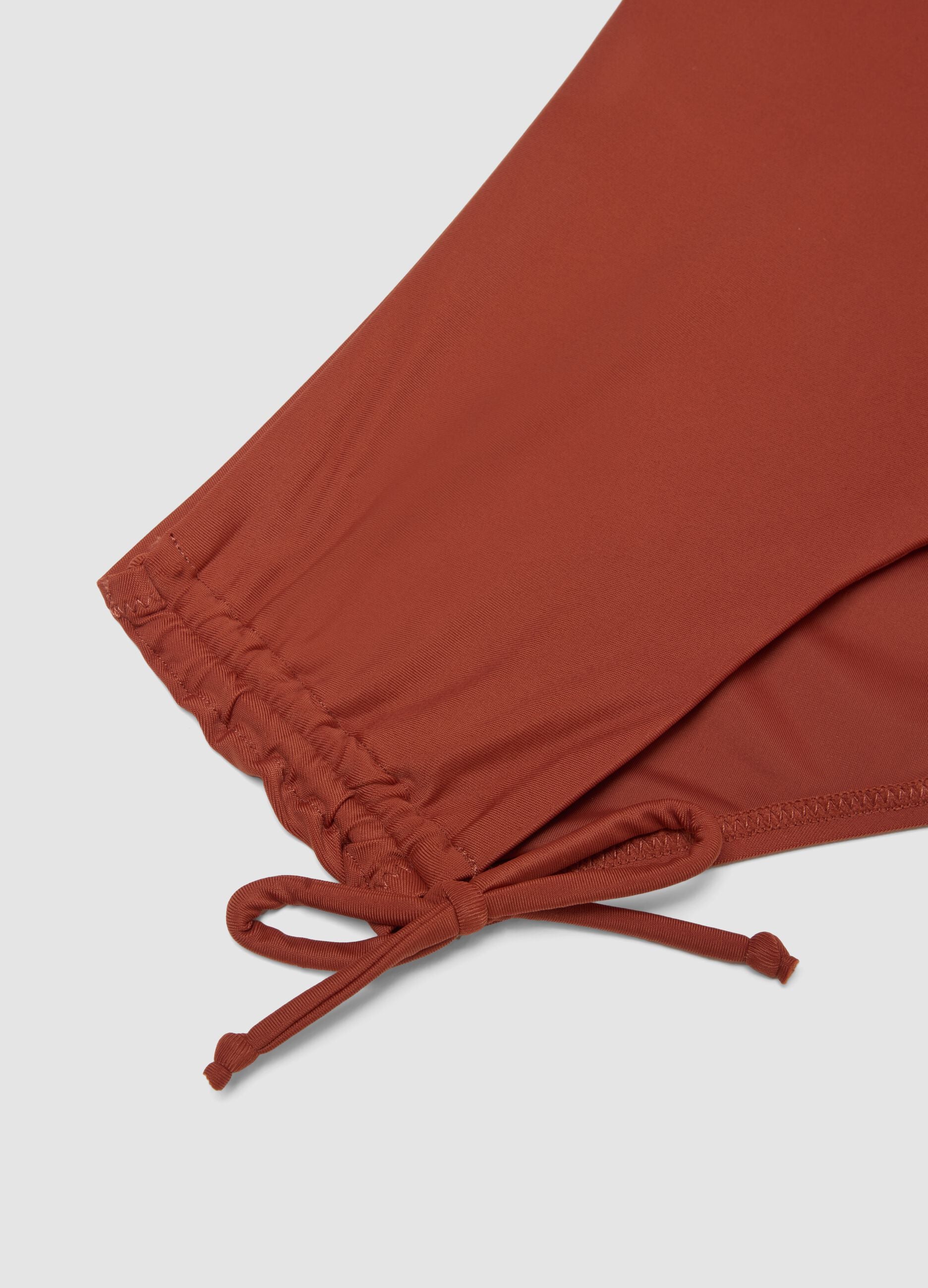 Slip da mare elasticizzato arancioni con dettagli arricciati