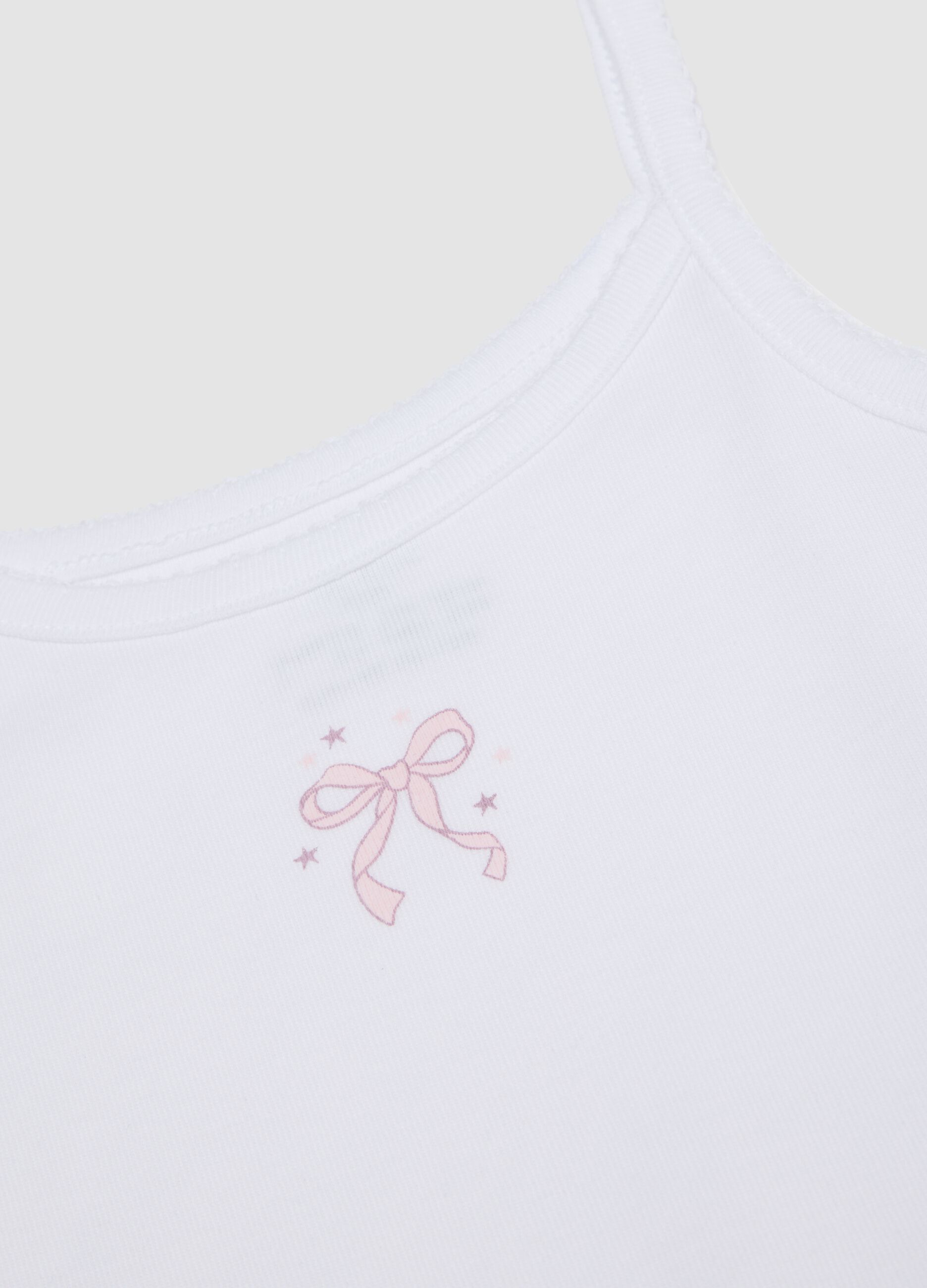 2-pack of white and pink organic cotton vests for girls