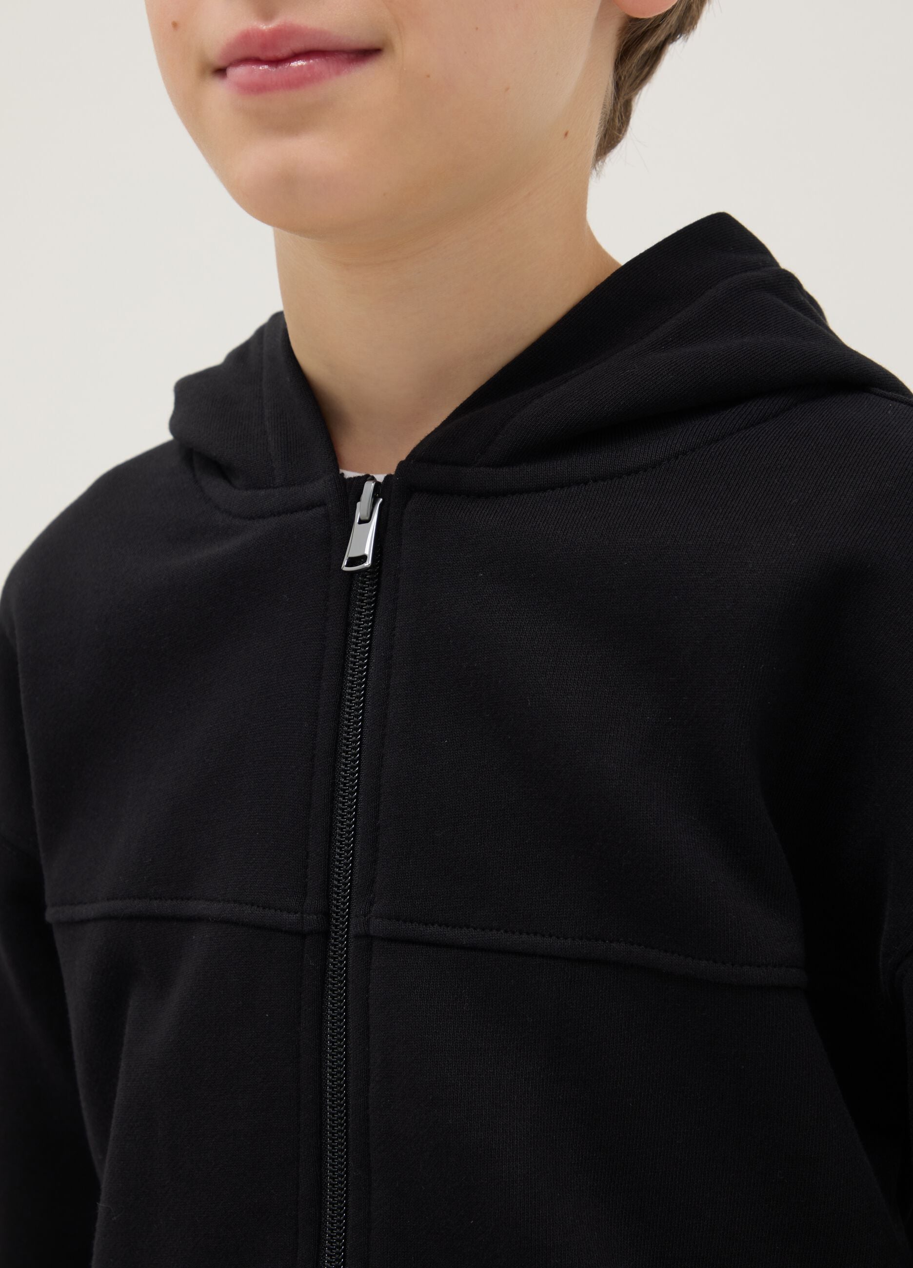 Black sweatshirt for boys in pure cotton with oversized fit, hood and zip