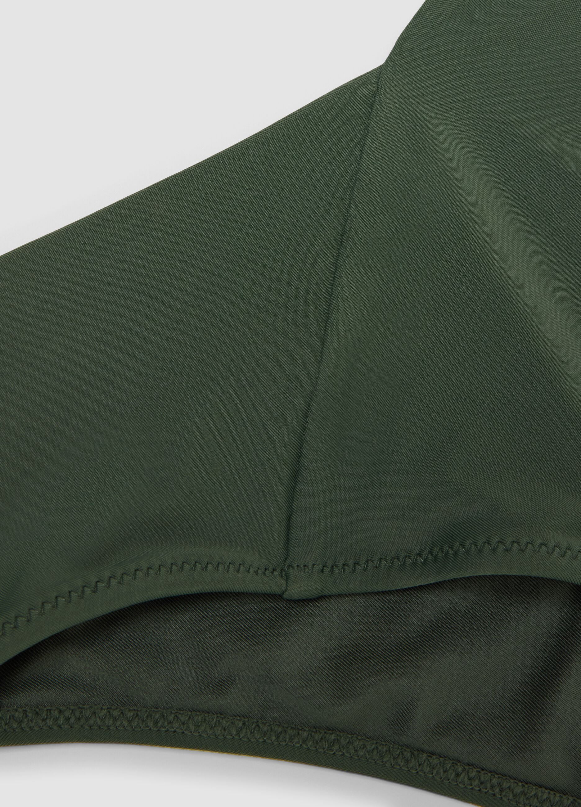 High-waisted green stretch bikini bottoms