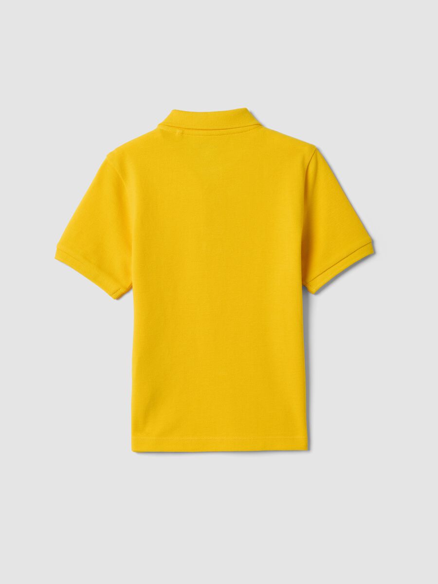 Yellow short-sleeve polo shirt in pure organic cotton for boys_1