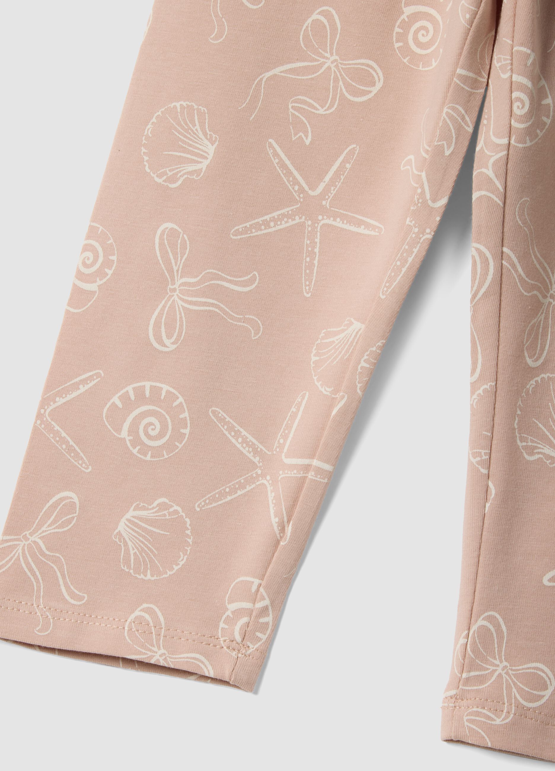 Pink organic cotton leggings with seaside print