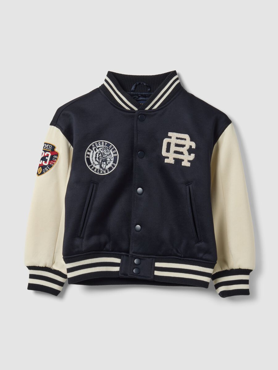 Blue varsity jacket with beige sleeves and print for boys_3