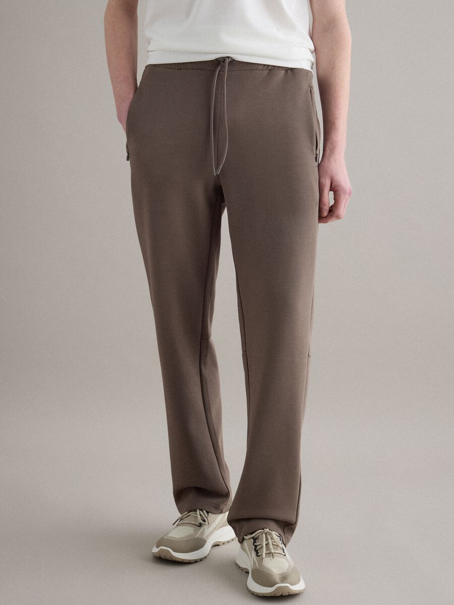 Brown regular fit stretch cotton blend jogger trousers_1