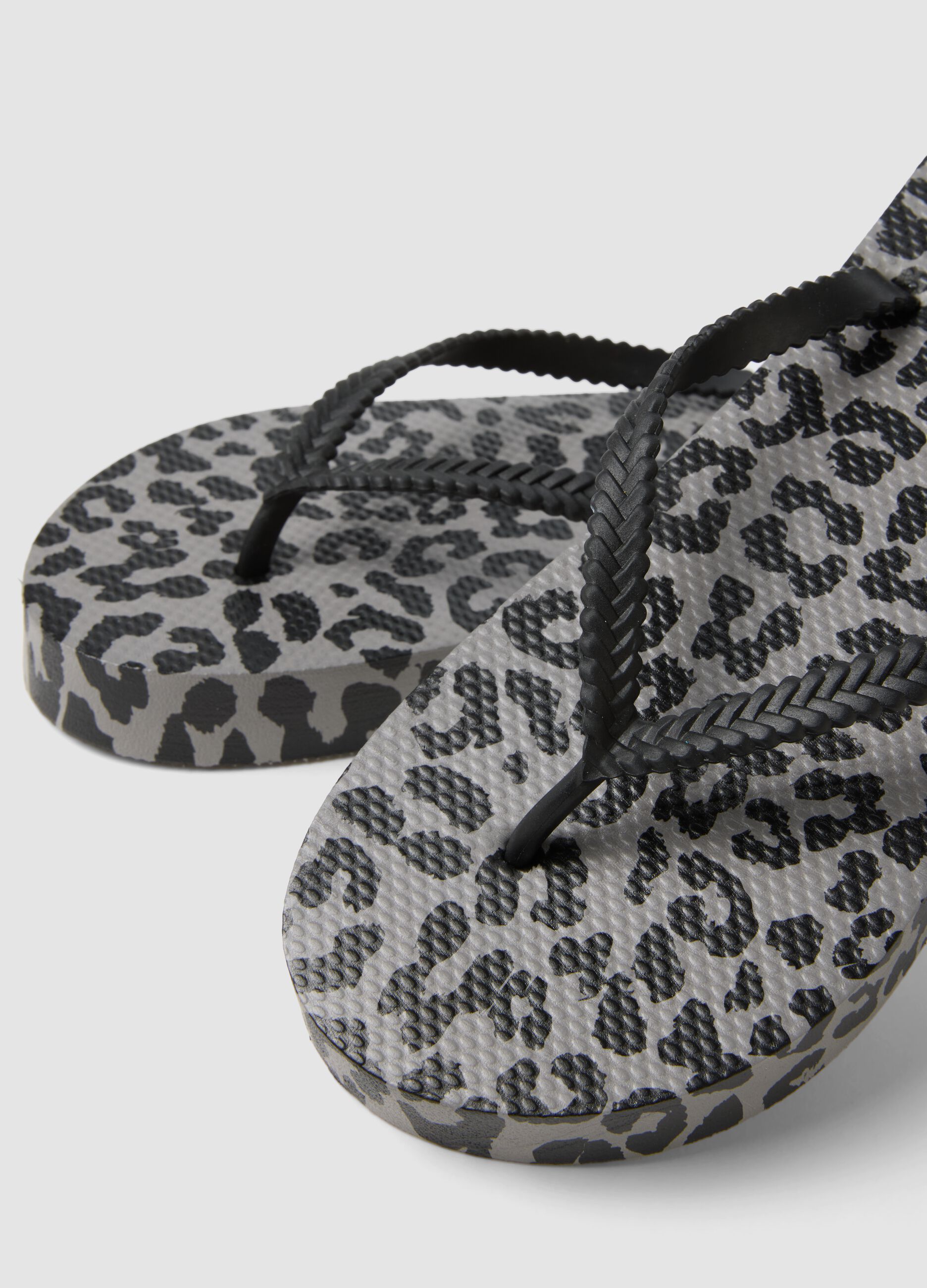 Multicoloured animal print flip-flops