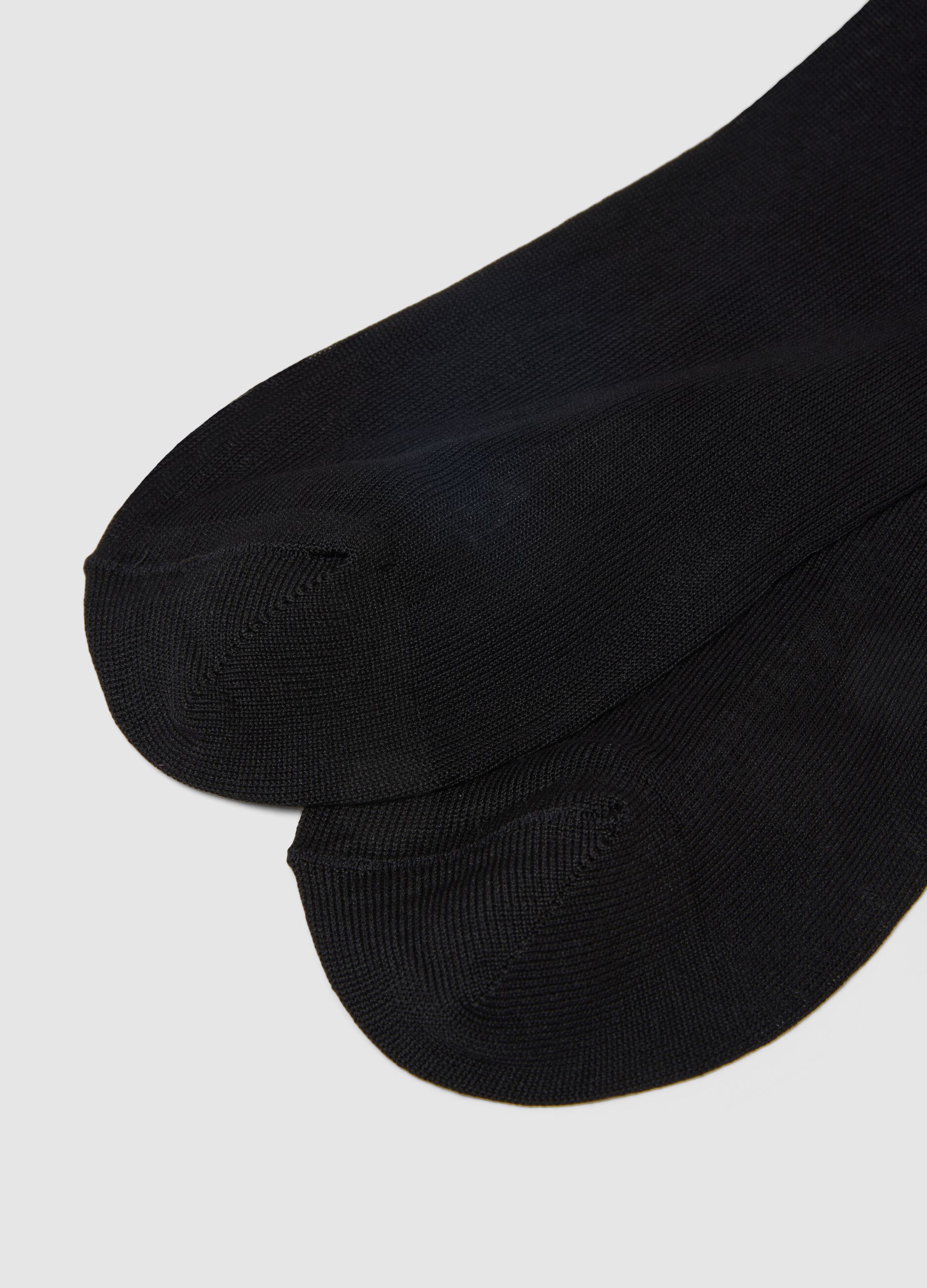 Three-pack long socks in pure black cotton regular fit