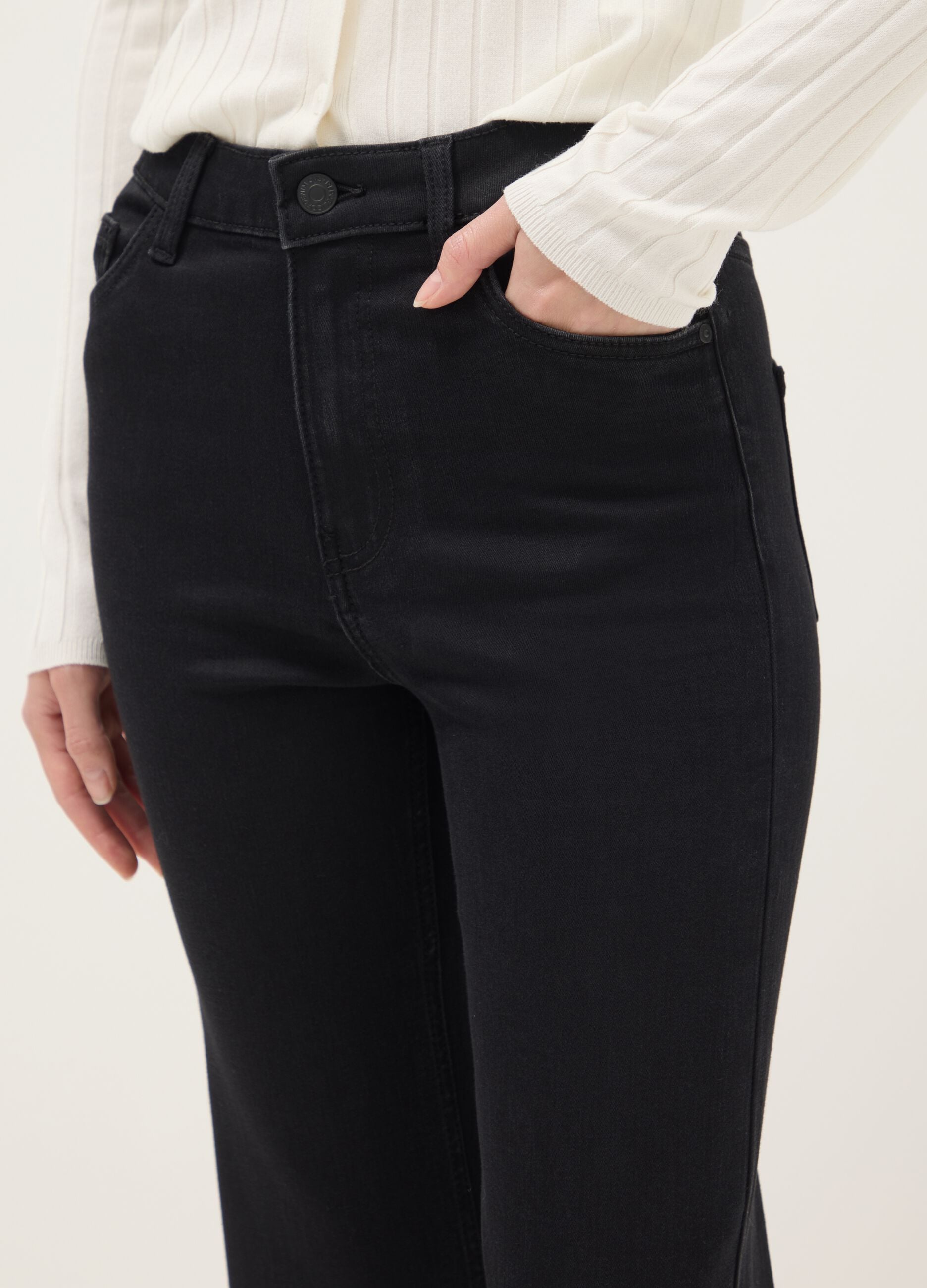 Black denim jeans with bootcut fit
