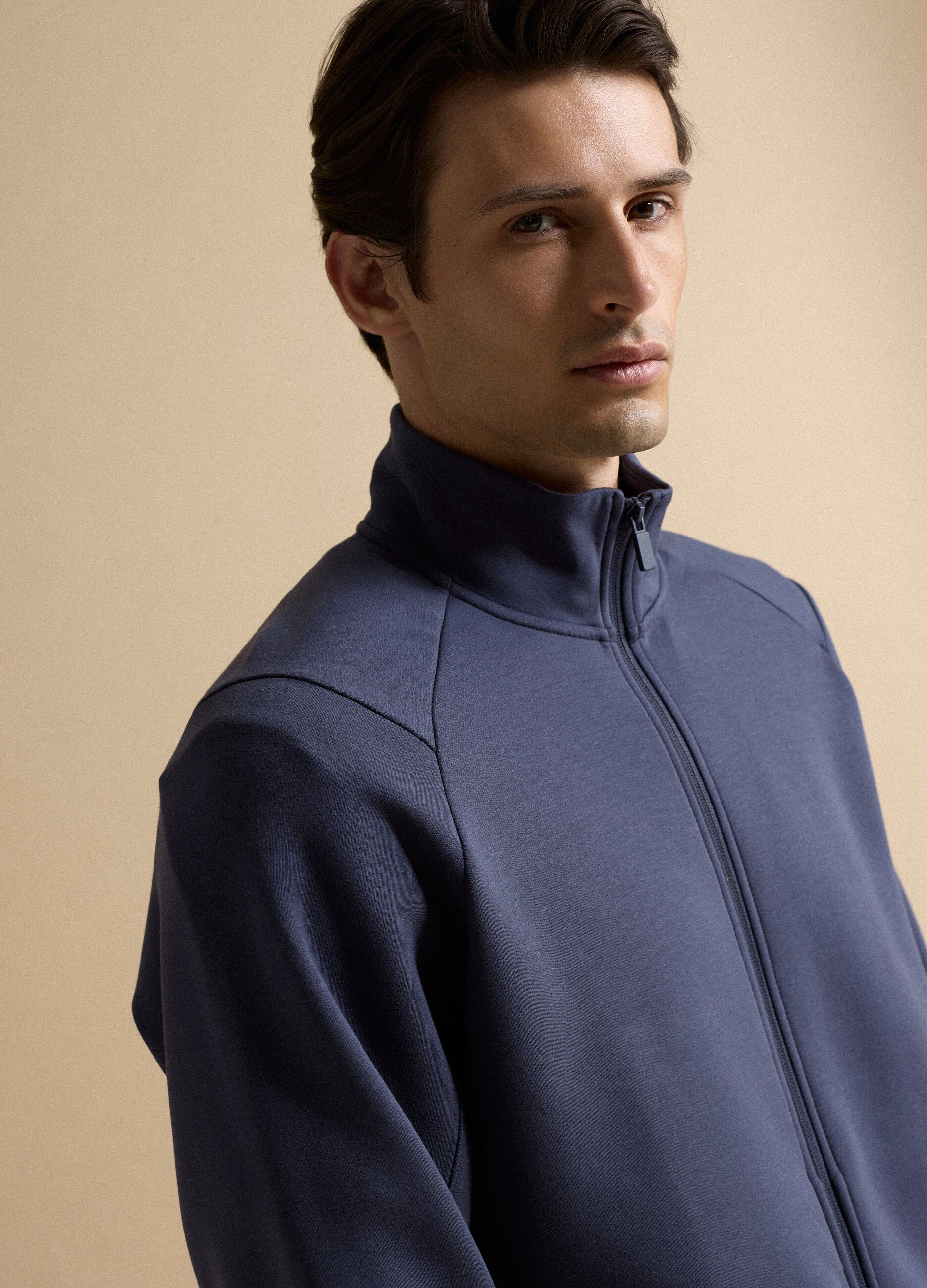 Blue full-zip jacket with stretch Easy Dry fabric collar, regular fit