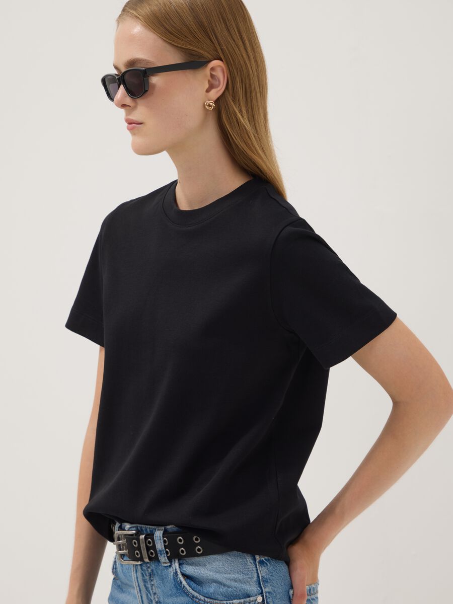 T-shirt relaxed fit nera in puro cotone a maniche corte_0