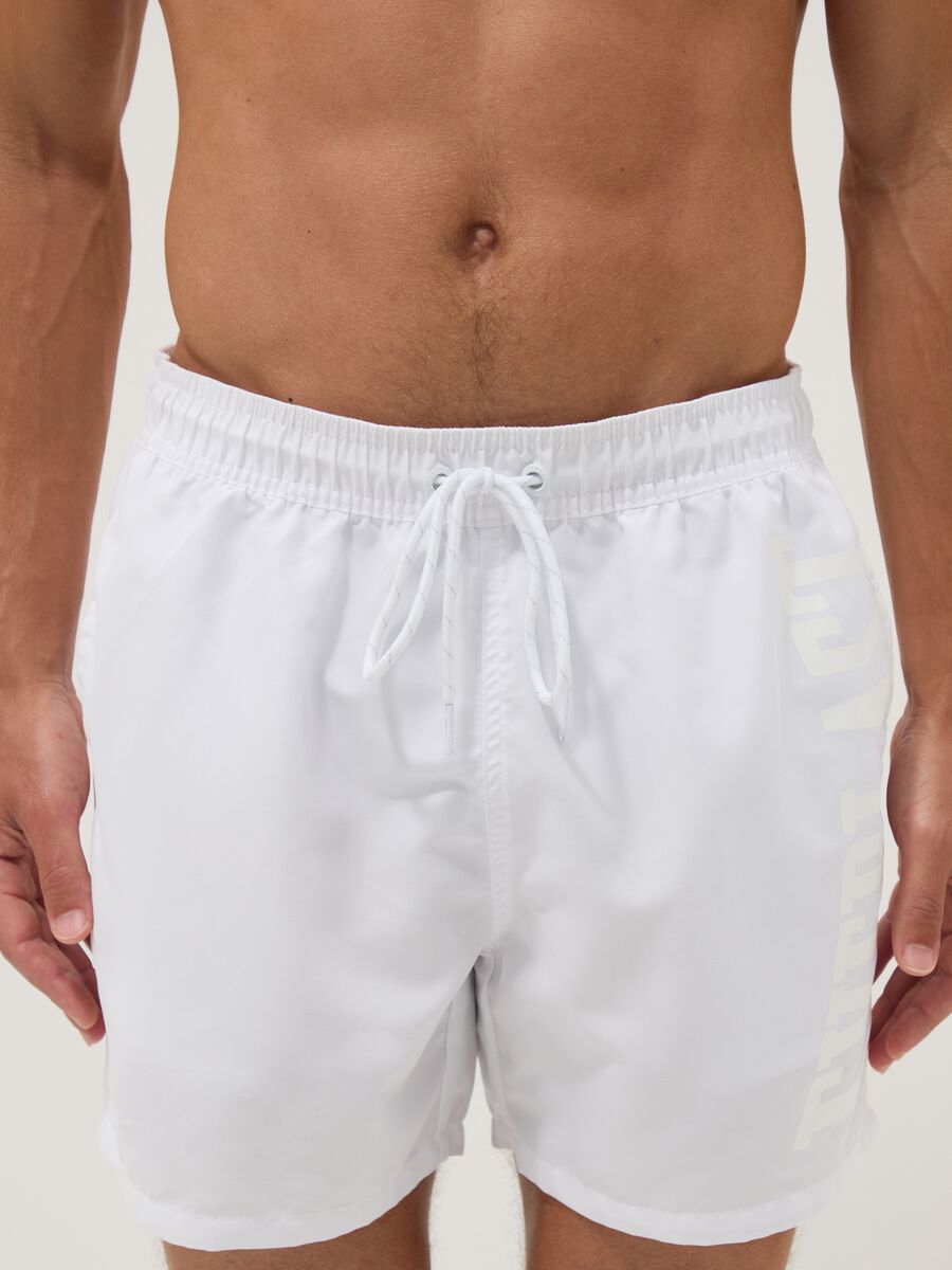 White swim shorts with drawstring_1