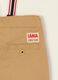 Beige baby trousers in stretch cotton with braces_1