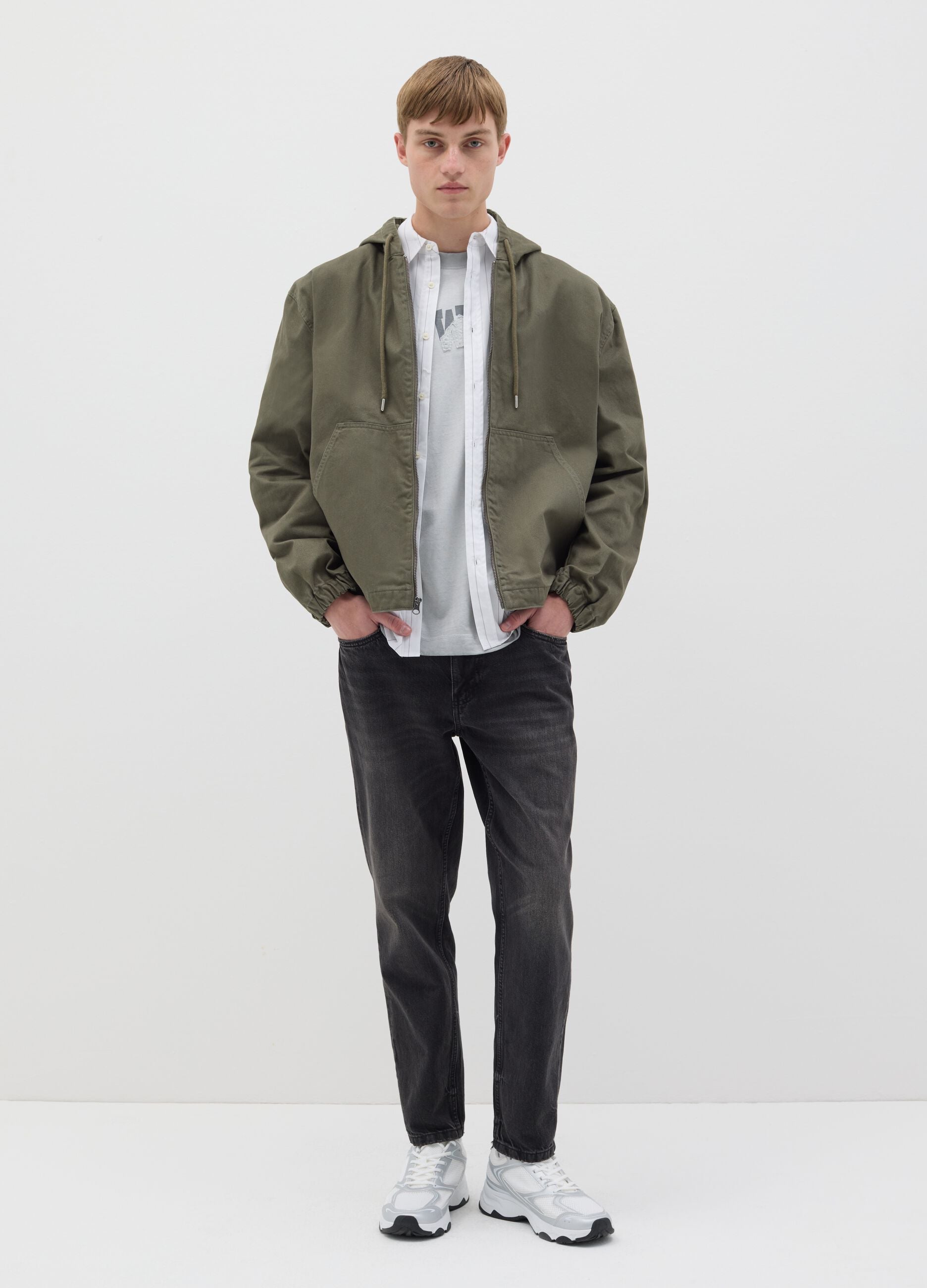 Short green full-zip jacket with hood