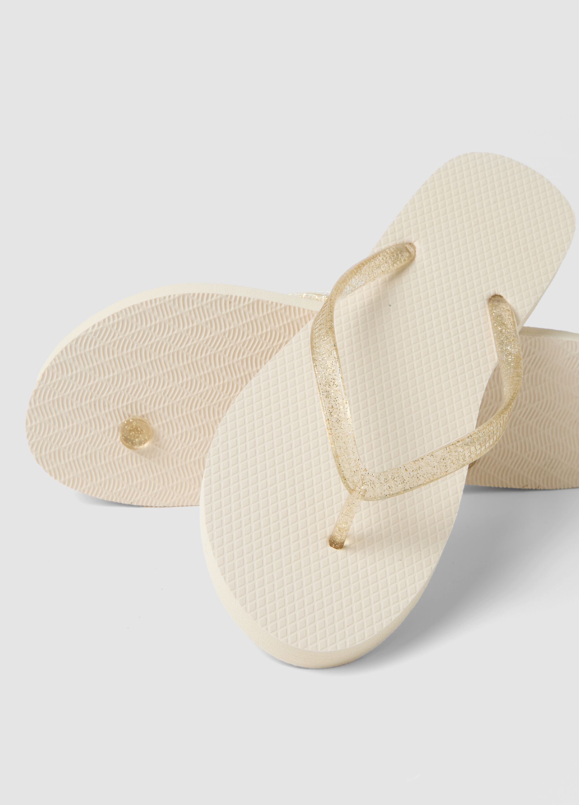Beige flip-flops with translucent straps