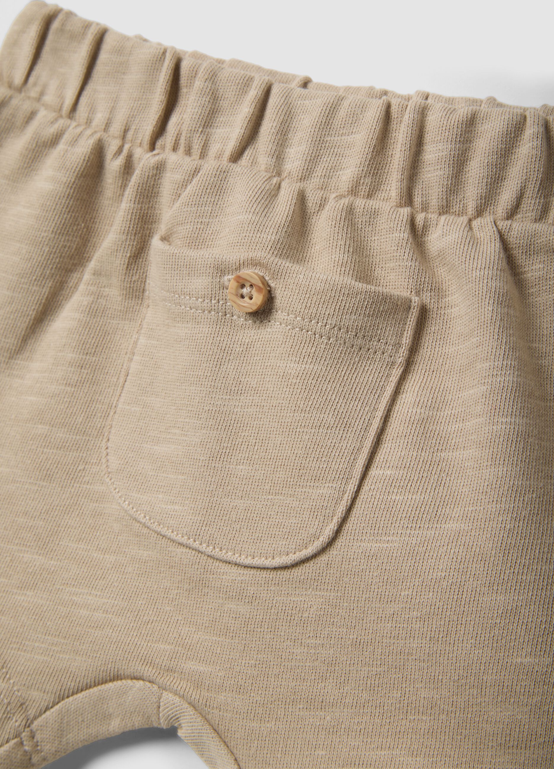 Beige organic cotton newborn set with relaxed fit