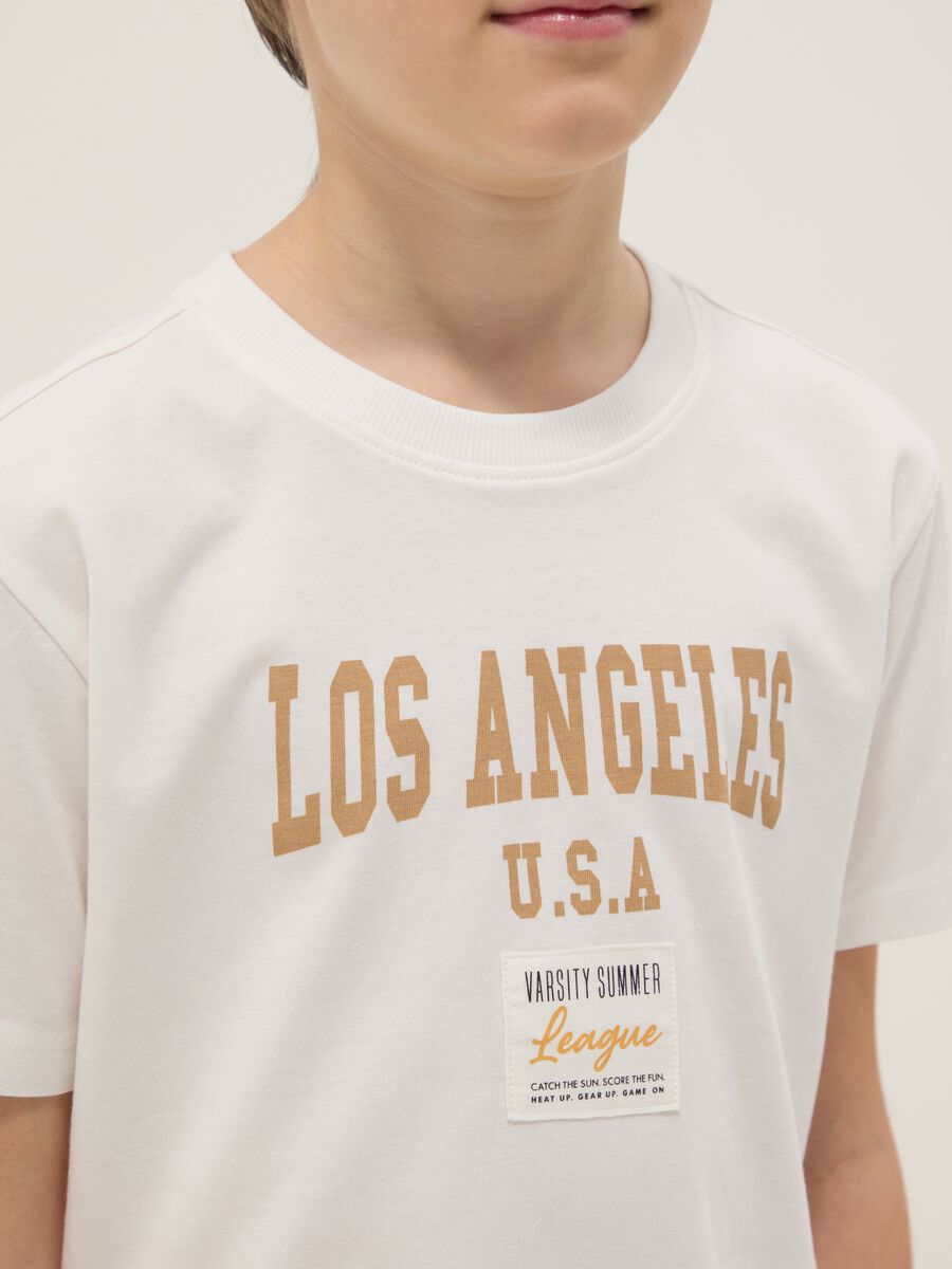 T-shirt in puro cotone bianca da ragazzo regular fit con stampa_2