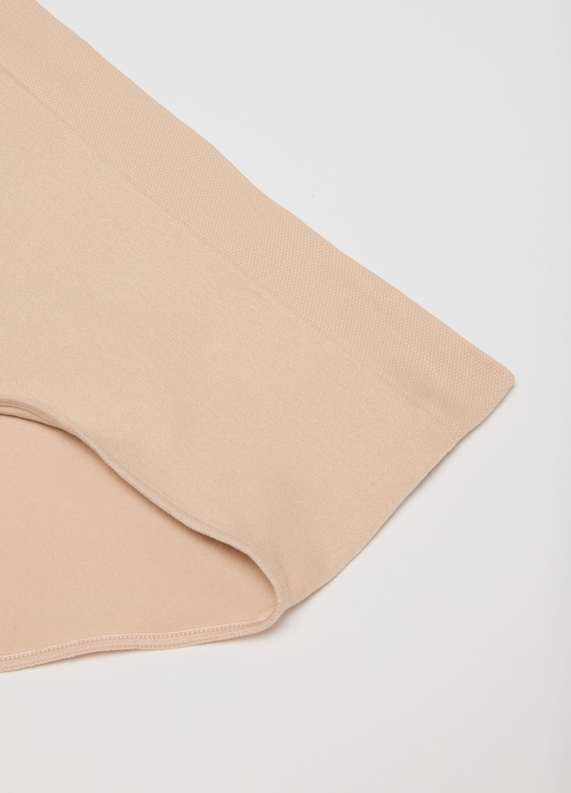 High-waisted beige briefs