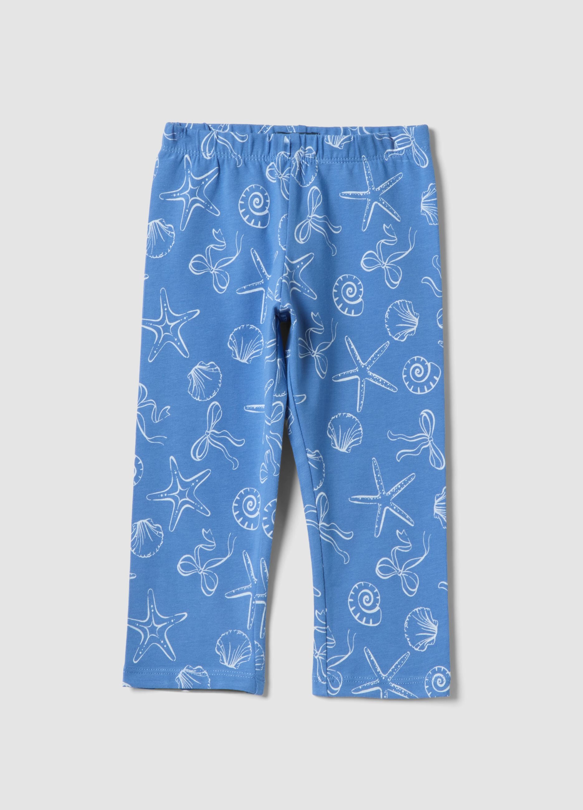Girls&rsquo; skinny light blue stretch cotton leggings with prints